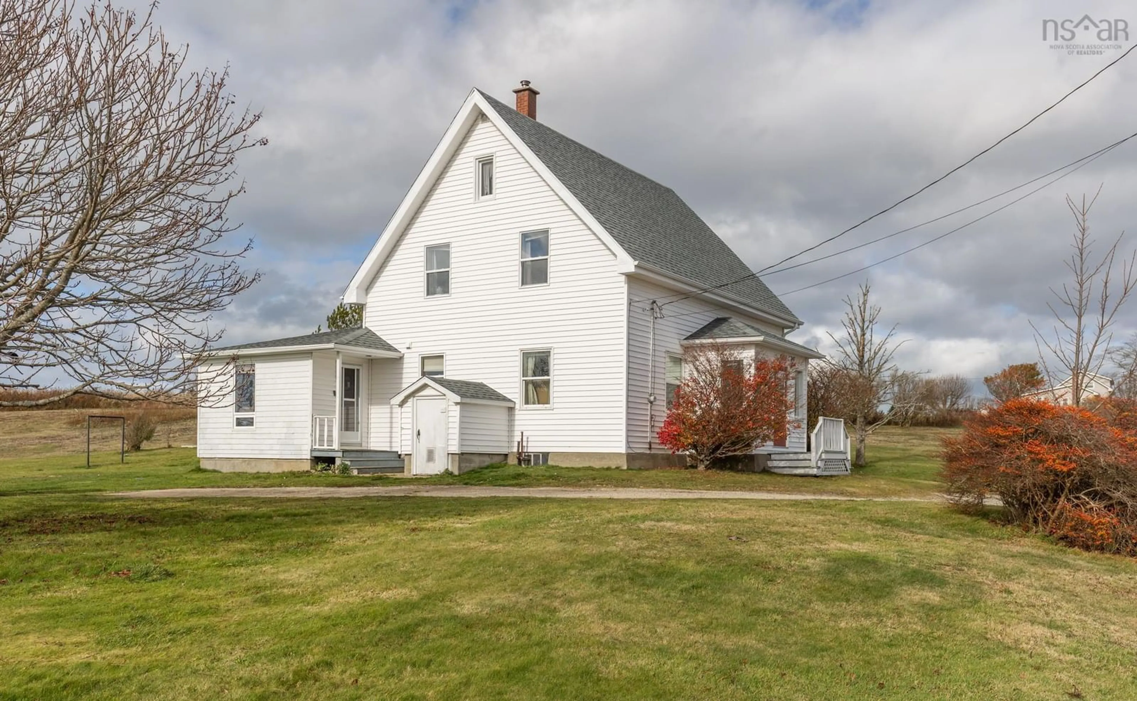 A pic from outside/outdoor area/front of a property/back of a property/a pic from drone, street for 5347 Highway 1, Salmon River Nova Scotia B5A 5B2