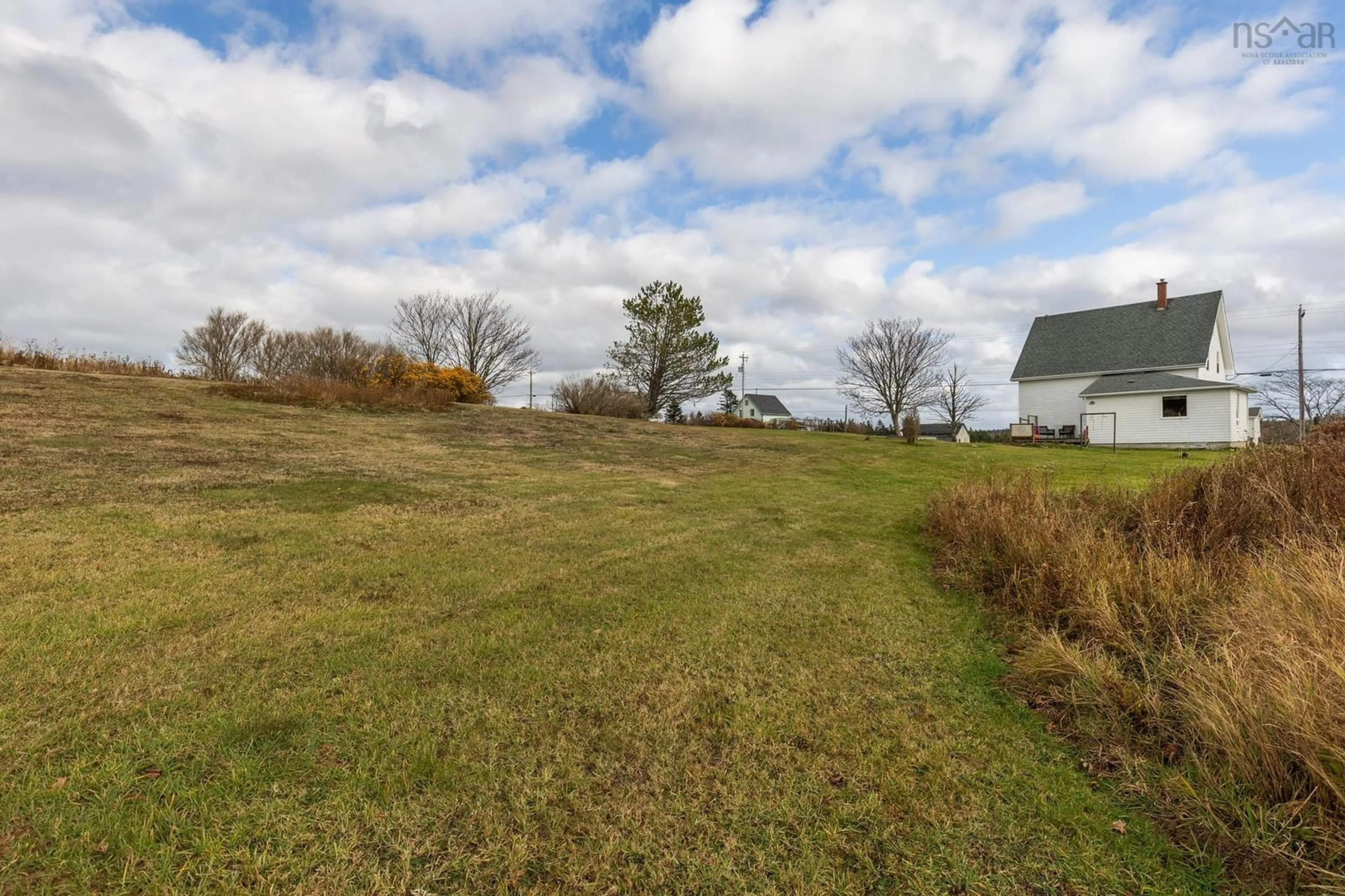 A pic from outside/outdoor area/front of a property/back of a property/a pic from drone, water/lake/river/ocean view for 5347 Highway 1, Salmon River Nova Scotia B5A 5B2