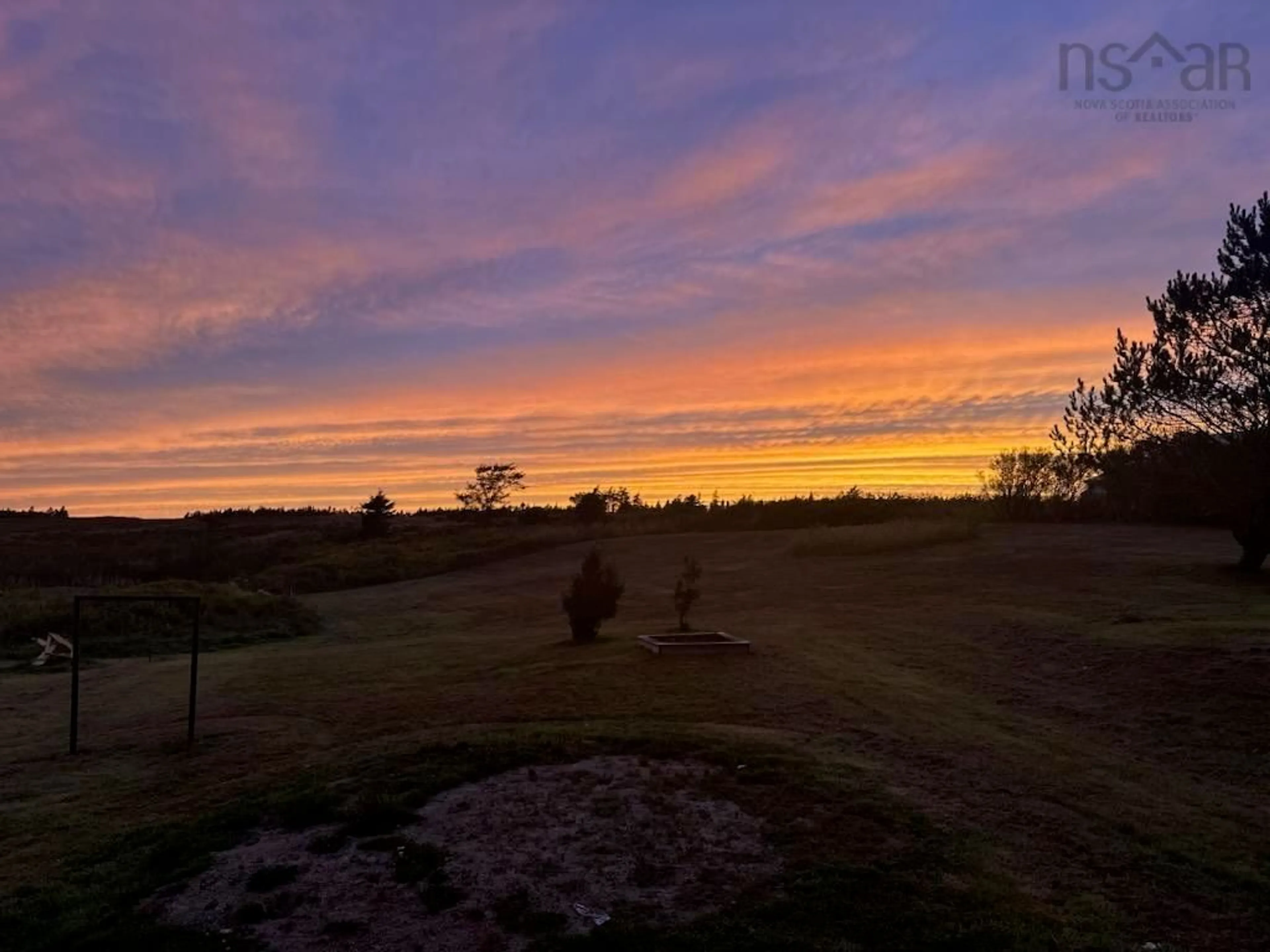 A pic from outside/outdoor area/front of a property/back of a property/a pic from drone, mountain view for 5347 Highway 1, Salmon River Nova Scotia B5A 5B2