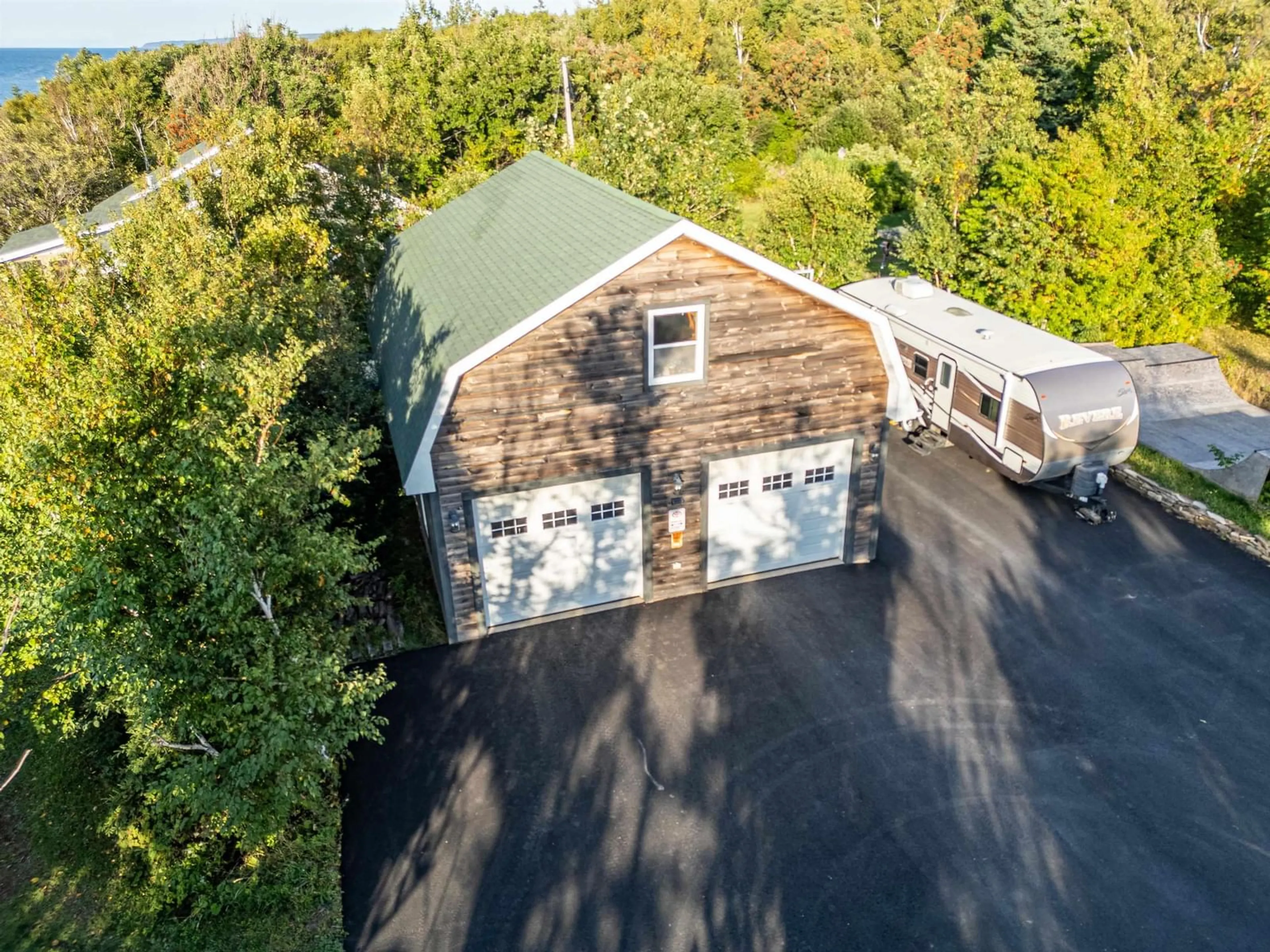 A pic from outside/outdoor area/front of a property/back of a property/a pic from drone, unknown for 24 Sandy Ranalds Lane, Arisaig Nova Scotia B2G 2L1