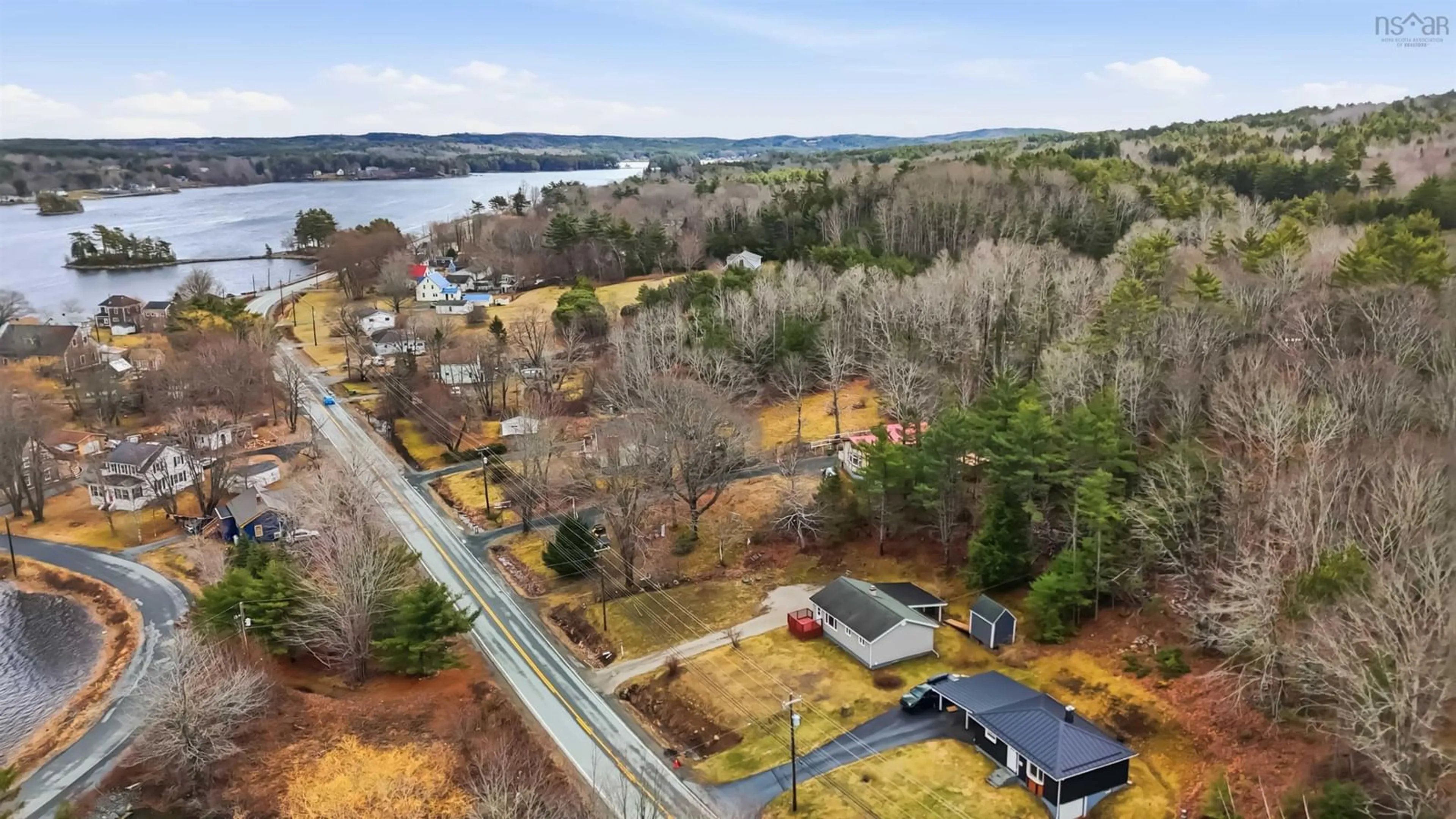A pic from outside/outdoor area/front of a property/back of a property/a pic from drone, water/lake/river/ocean view for 796 331 Hwy, Conquerall Bank Nova Scotia B4V 0H8