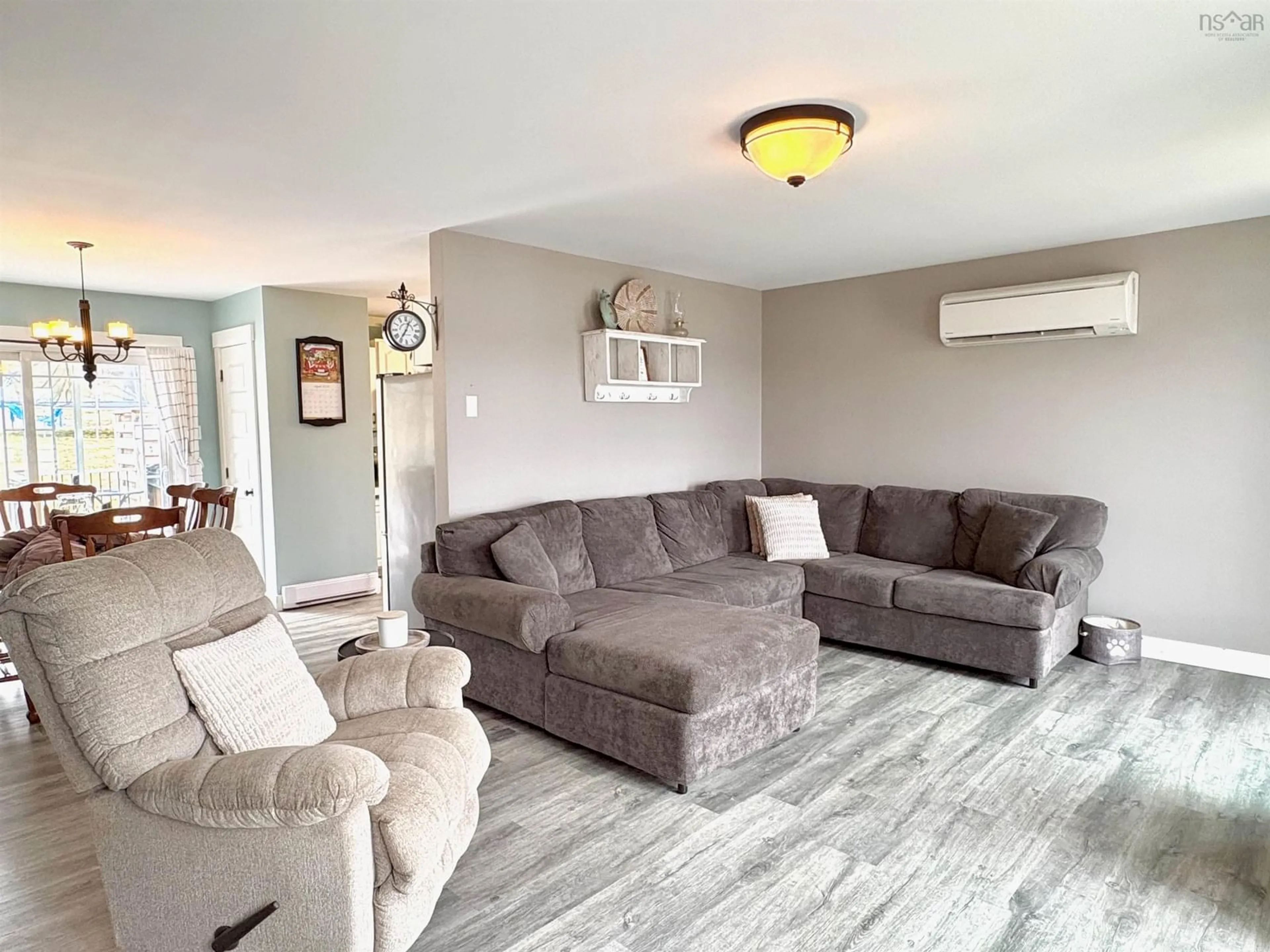 Living room with furniture, unknown for 128 Highway 1, Dayton Nova Scotia B5A 5A1