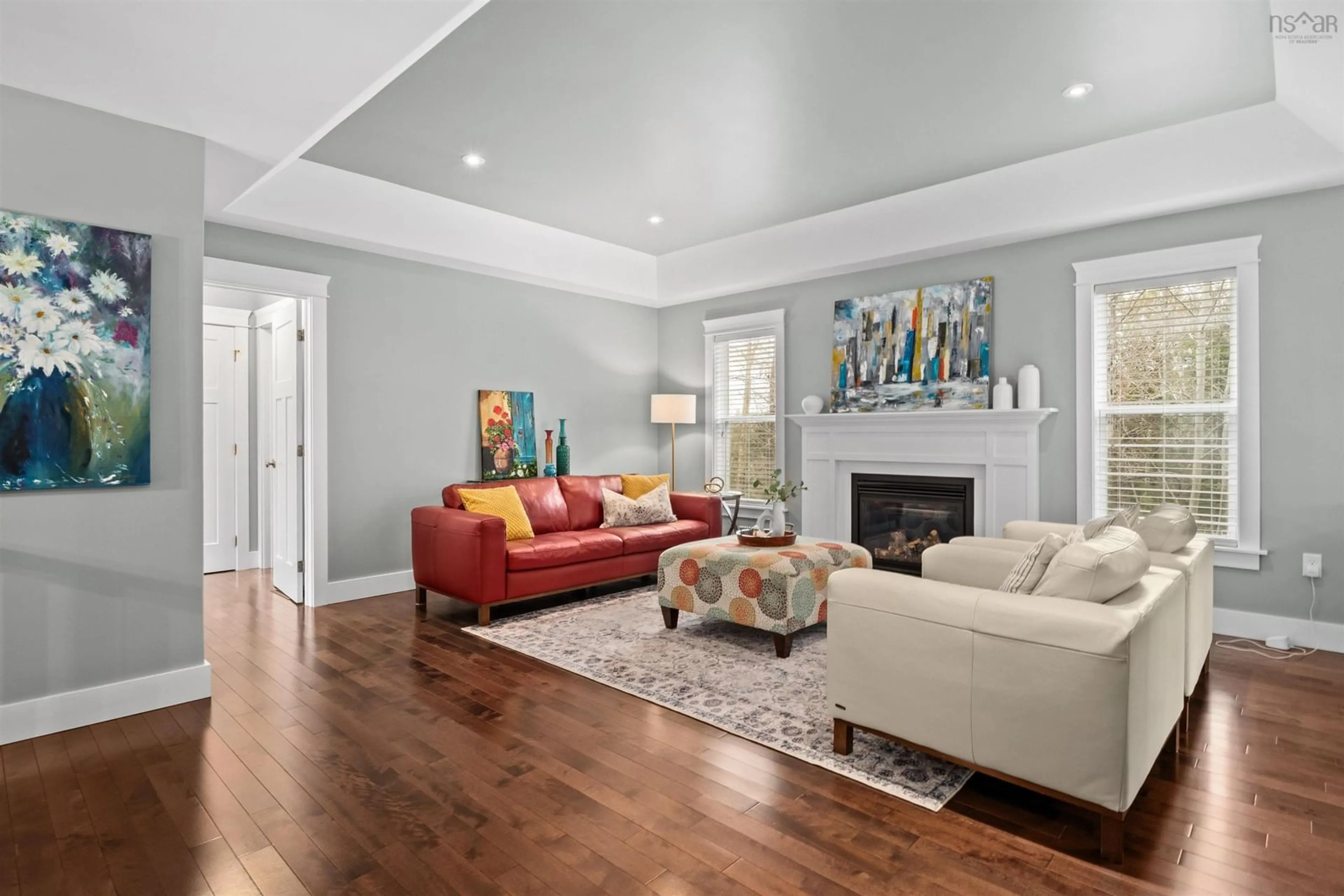 Living room with furniture, wood/laminate floor for 31 Colville Crt, Beaver Bank Nova Scotia B4G 1B8