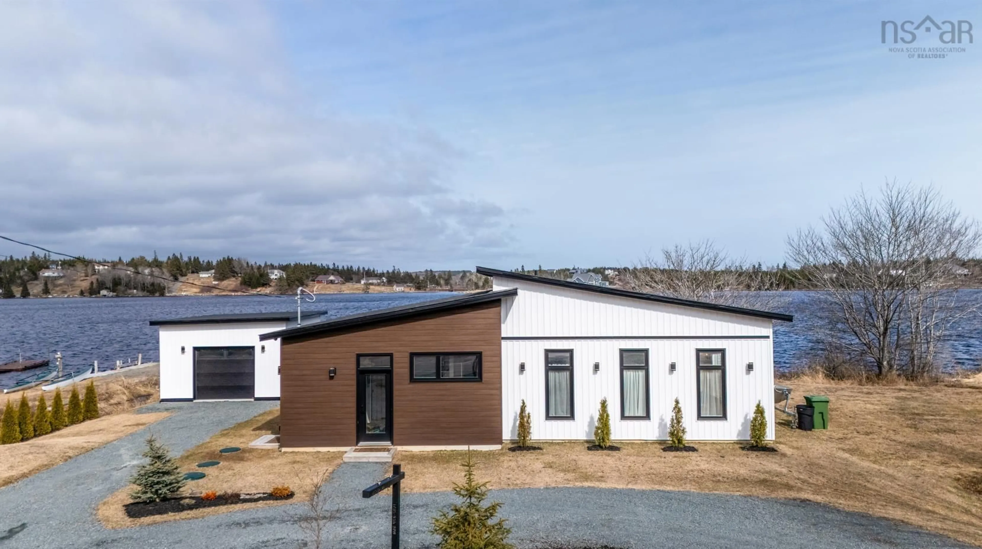 Home with vinyl exterior material, building for 1612 Crowell Rd, East Lawrencetown Nova Scotia B2Z 1N5