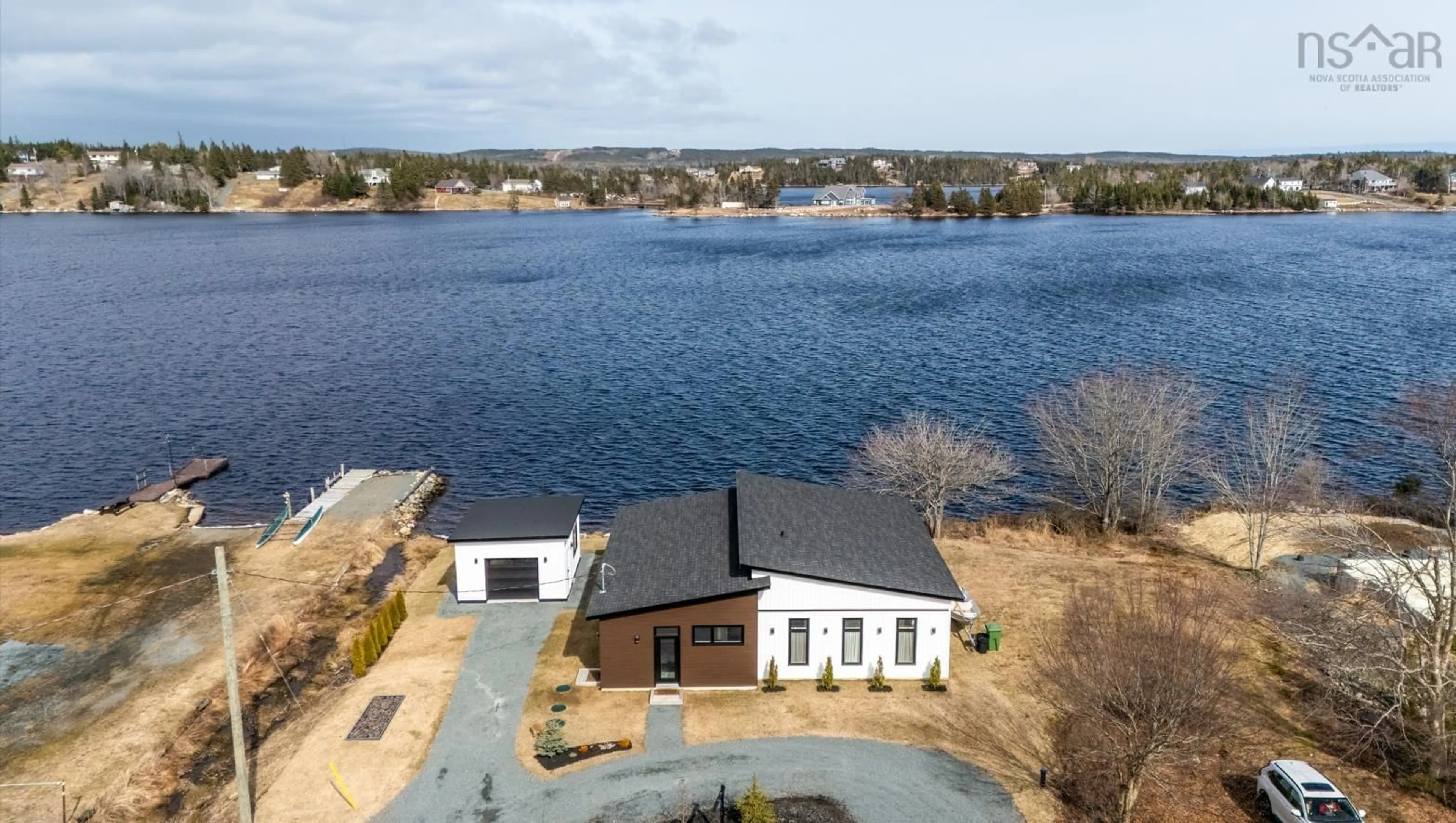 A pic from outside/outdoor area/front of a property/back of a property/a pic from drone, water/lake/river/ocean view for 1612 Crowell Rd, East Lawrencetown Nova Scotia B2Z 1N5