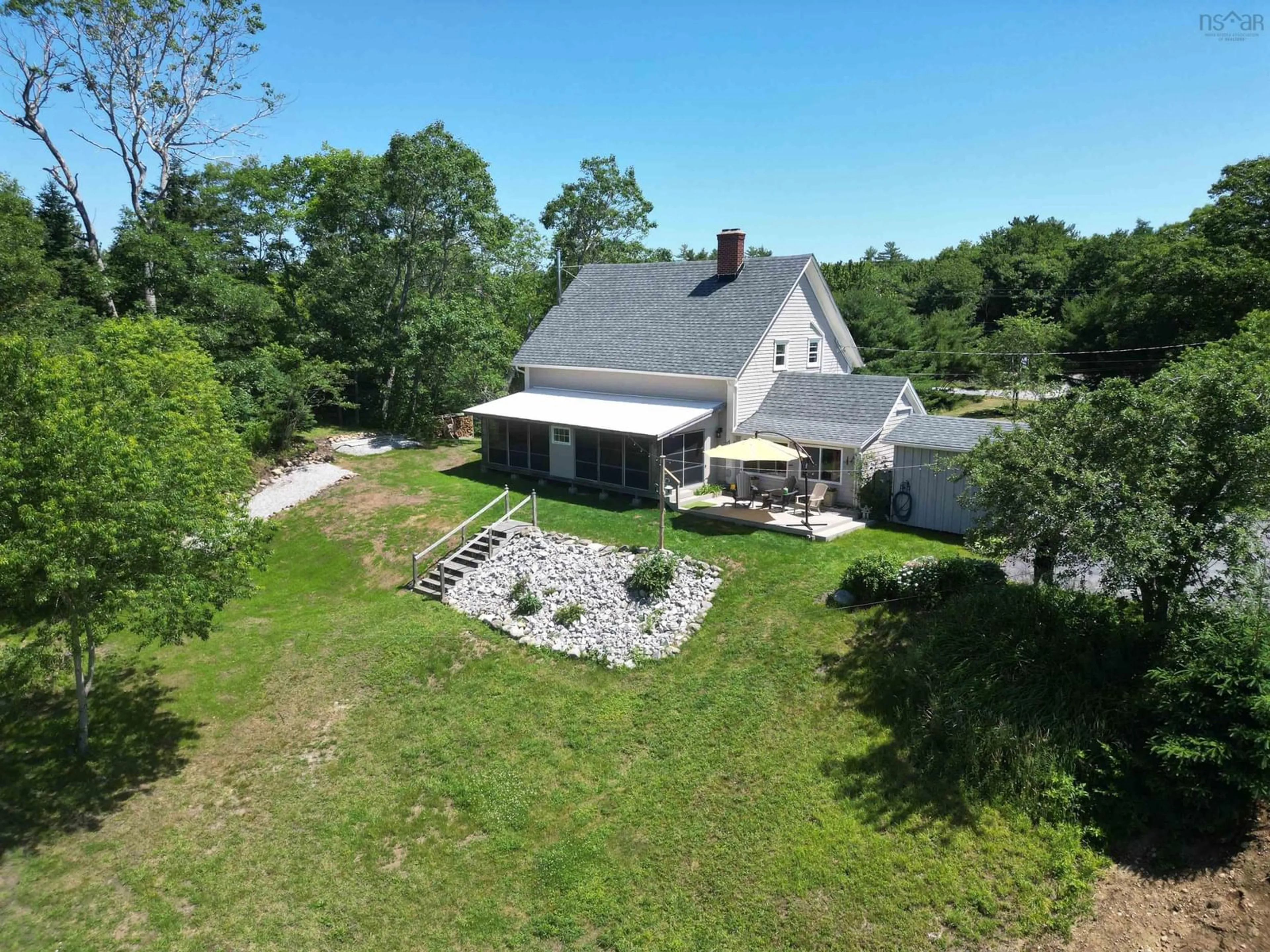 A pic from outside/outdoor area/front of a property/back of a property/a pic from drone, building for 6381 Highway 3, Jordan Falls Nova Scotia B0T 1J0