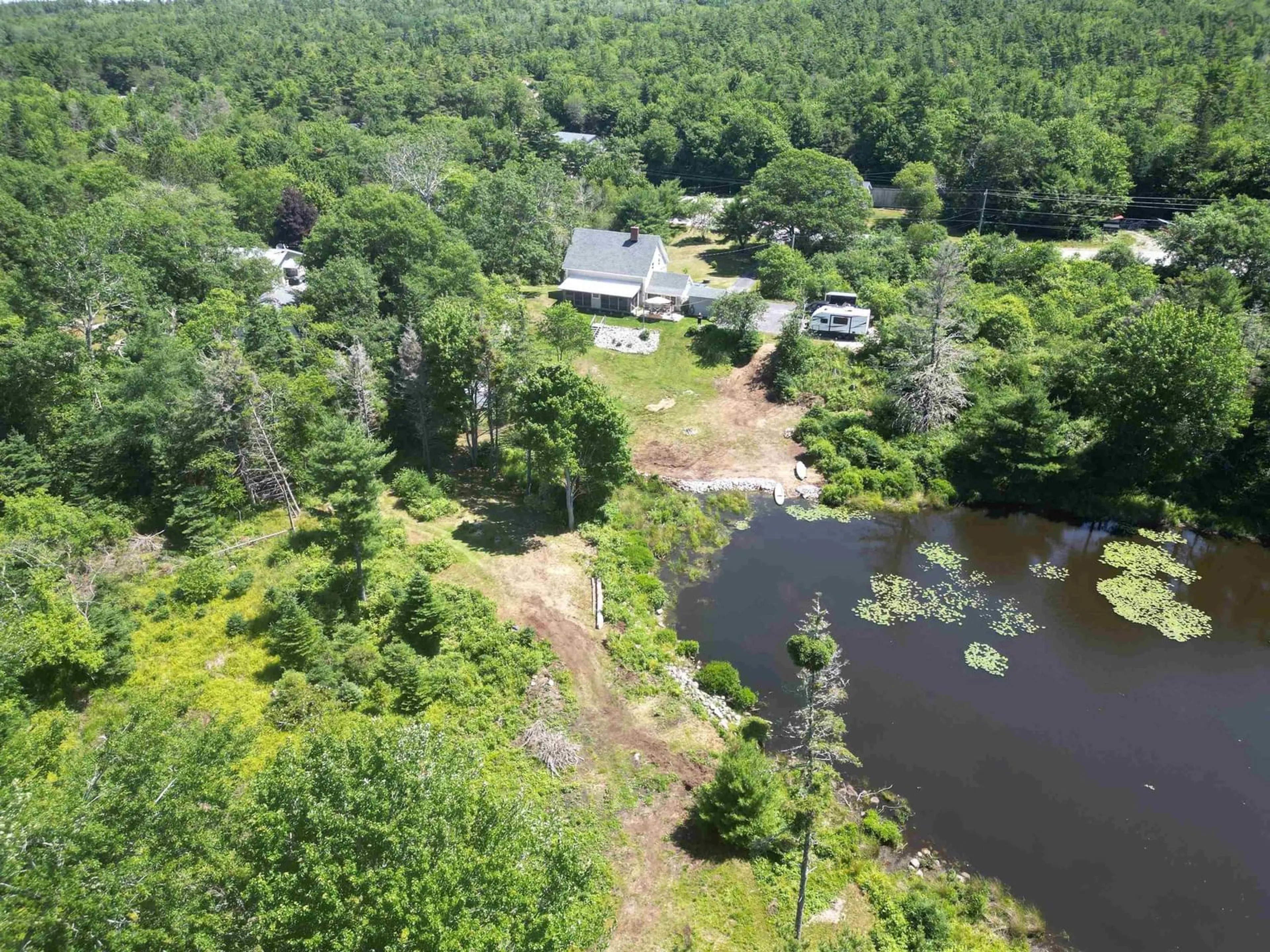 A pic from outside/outdoor area/front of a property/back of a property/a pic from drone, water/lake/river/ocean view for 6381 Highway 3, Jordan Falls Nova Scotia B0T 1J0