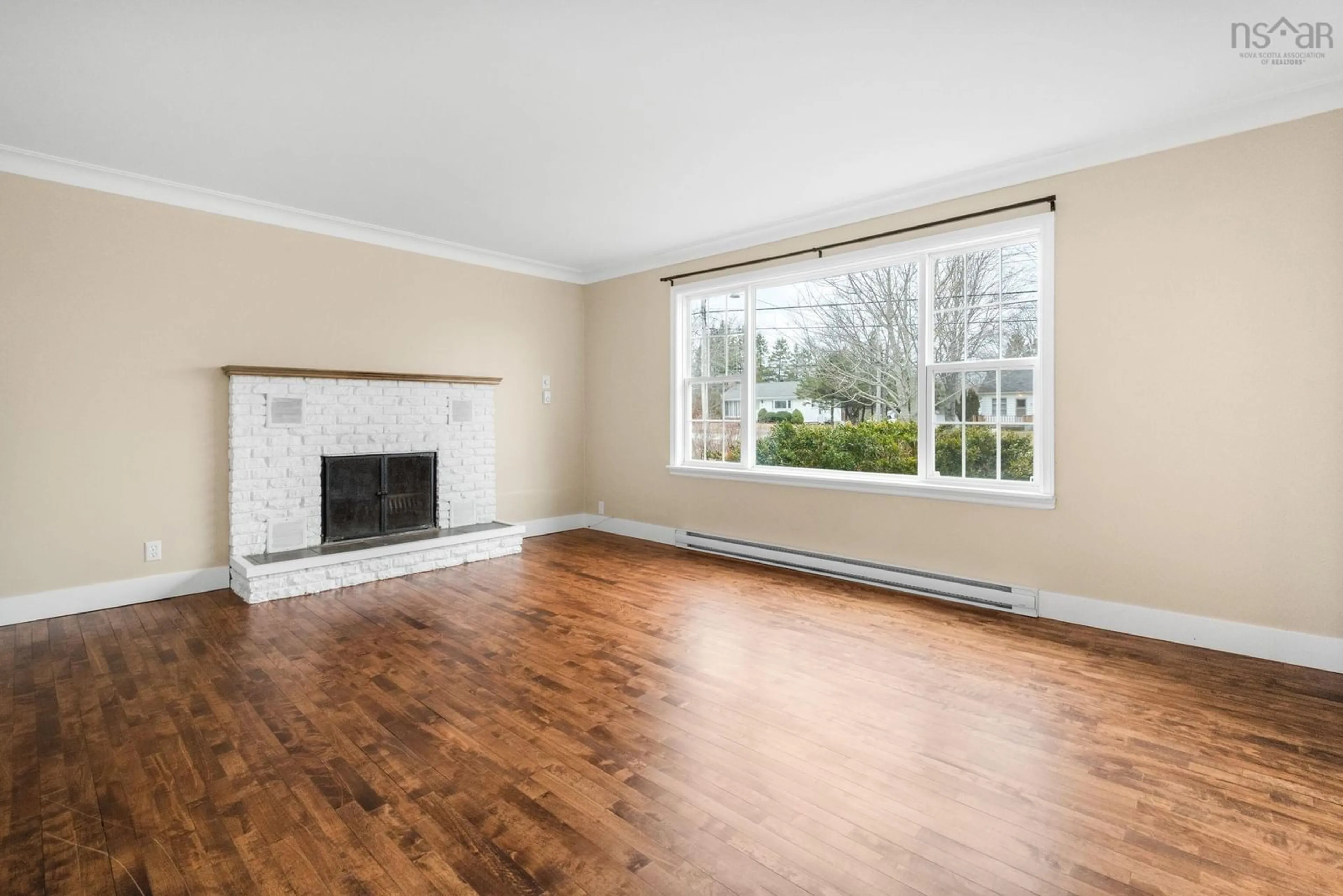 Living room with furniture, wood/laminate floor for 37 Highway 14, Milford Nova Scotia B0N 1Y0