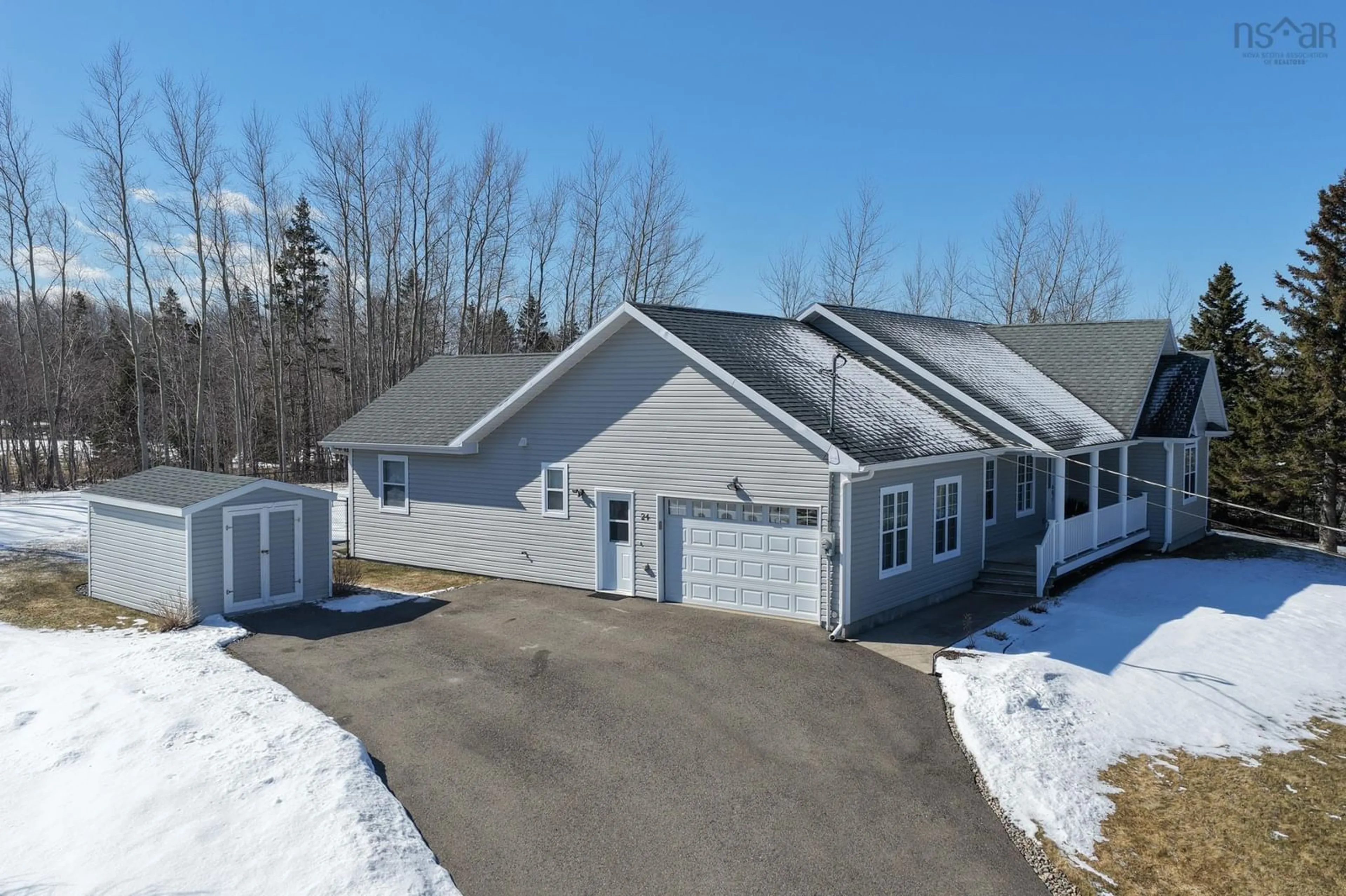 A pic from outside/outdoor area/front of a property/back of a property/a pic from drone, street for 24 Hampton Dr, Sydney River Nova Scotia B1L 0A1