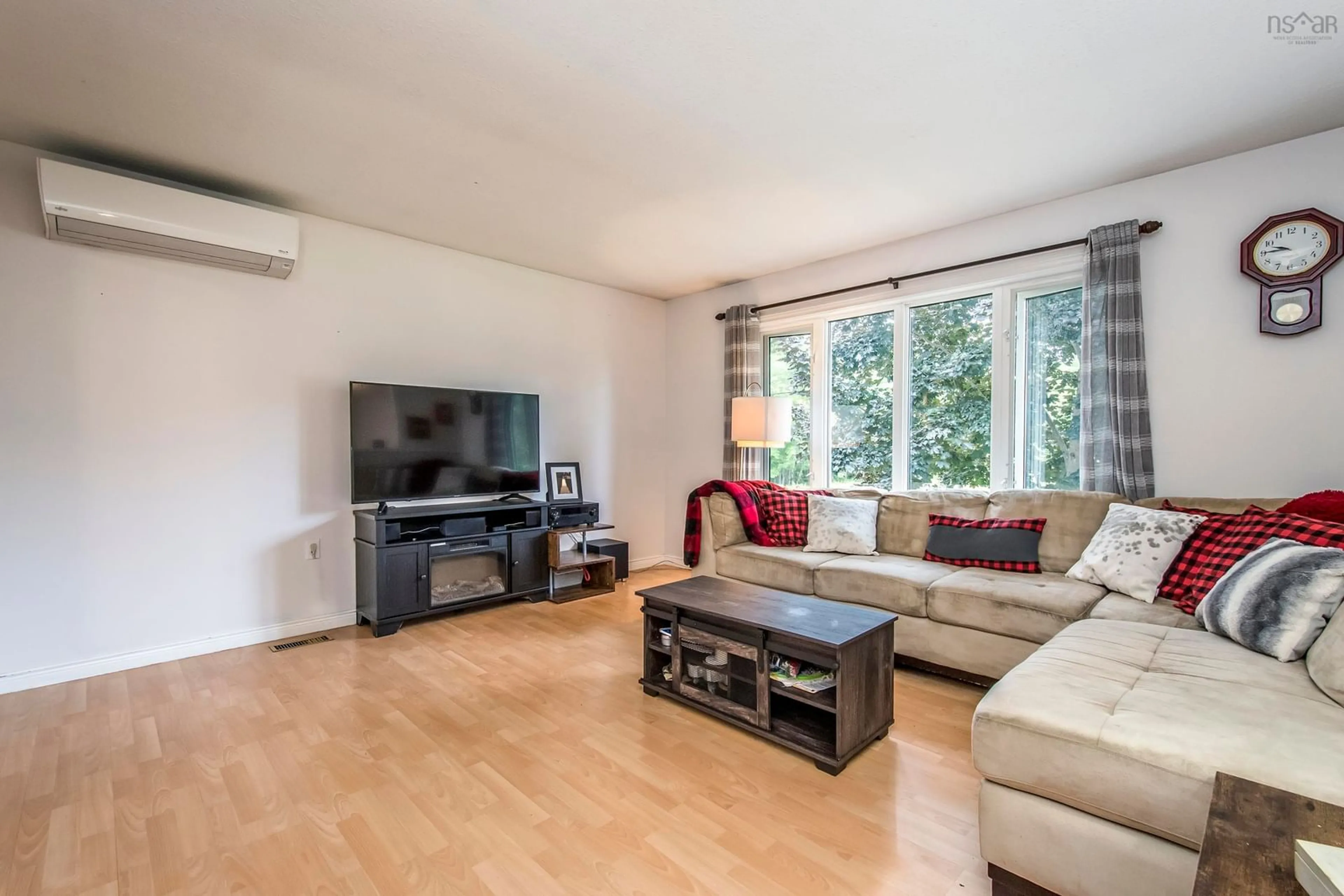Living room with furniture, wood/laminate floor for 578 Bluenose Ave, Meadowvale Nova Scotia B0P 1R0