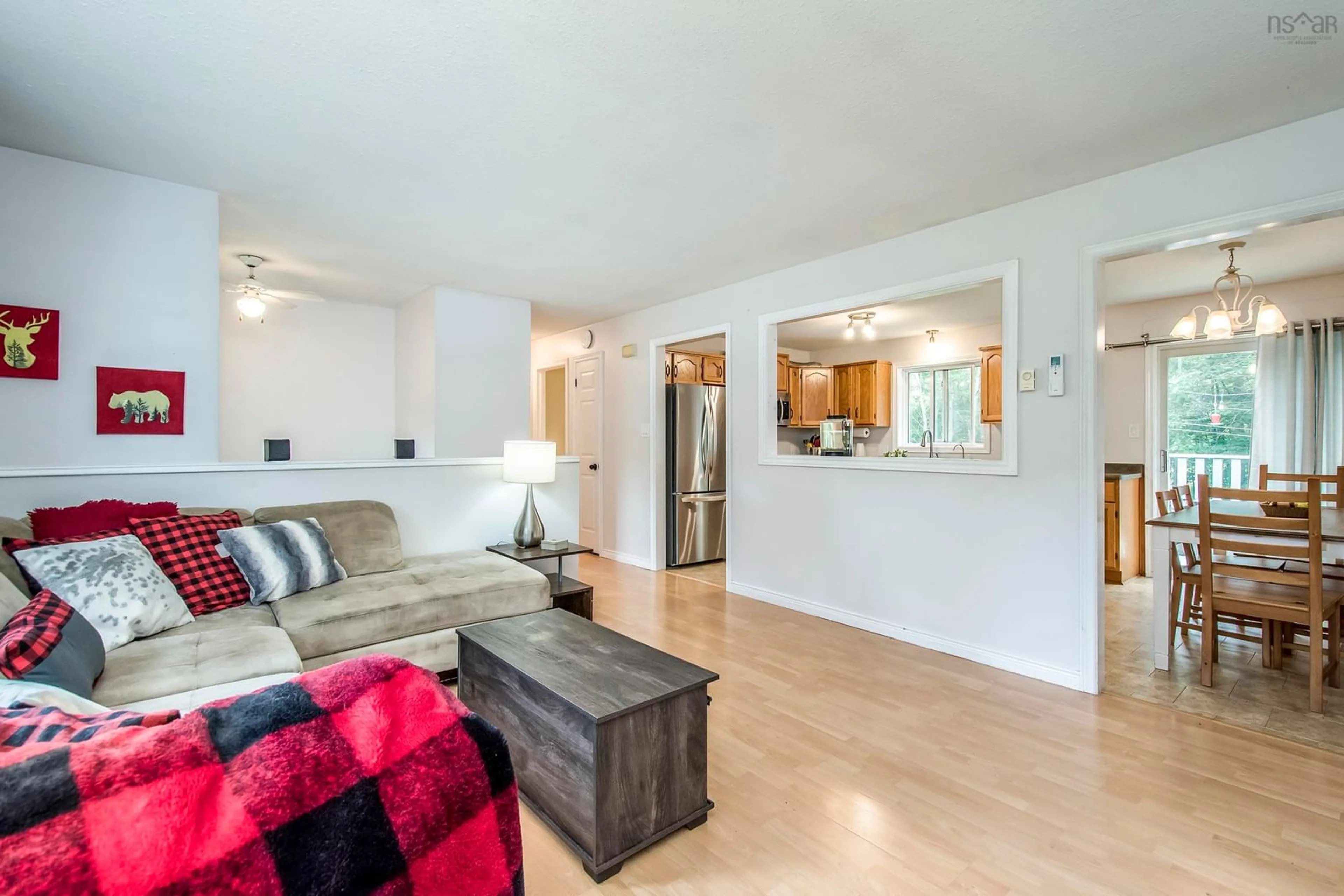 Living room with furniture, wood/laminate floor for 578 Bluenose Ave, Meadowvale Nova Scotia B0P 1R0