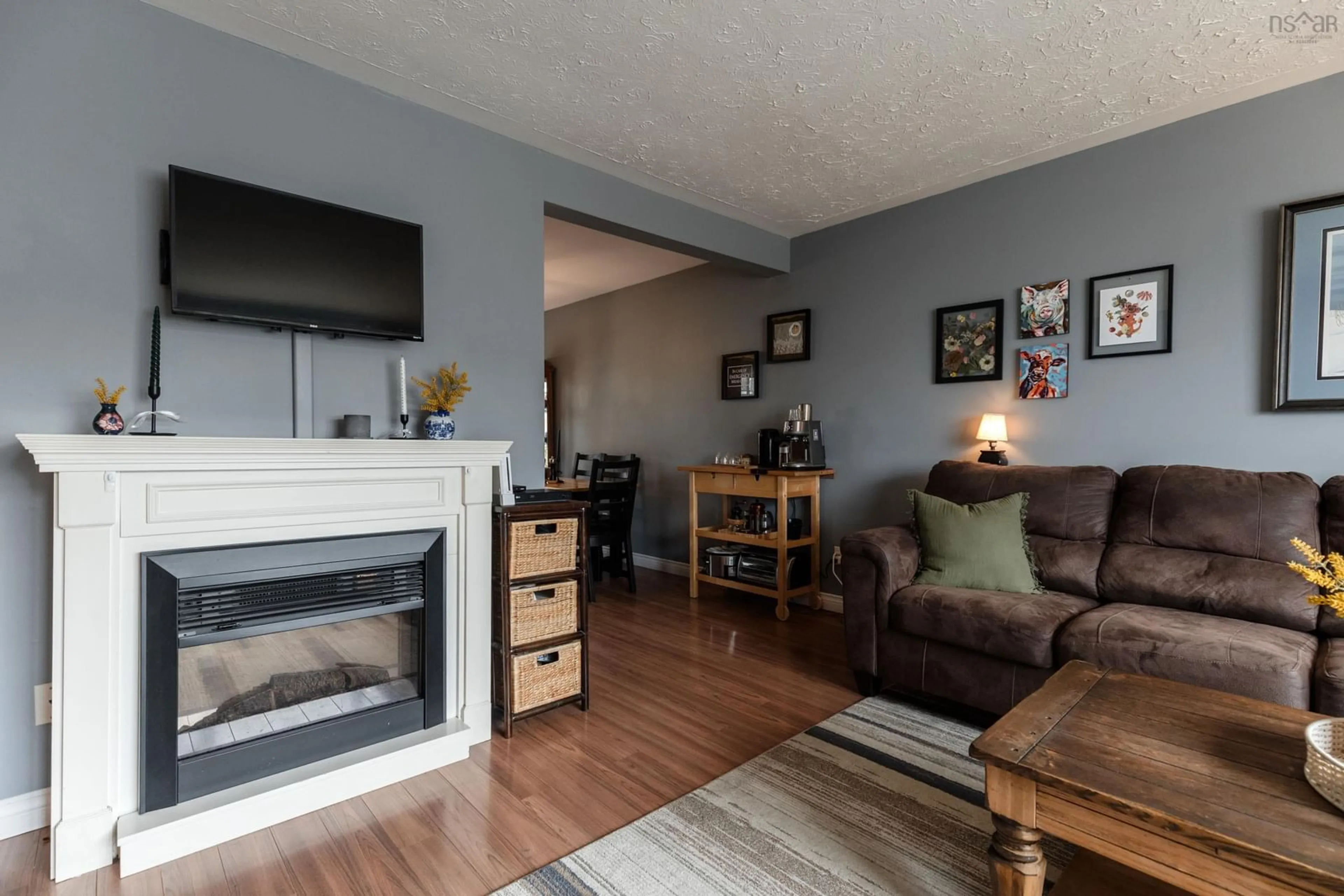 Living room with furniture, wood/laminate floor for 20 Matador Crt, Lower Sackville Nova Scotia B4C 3G9