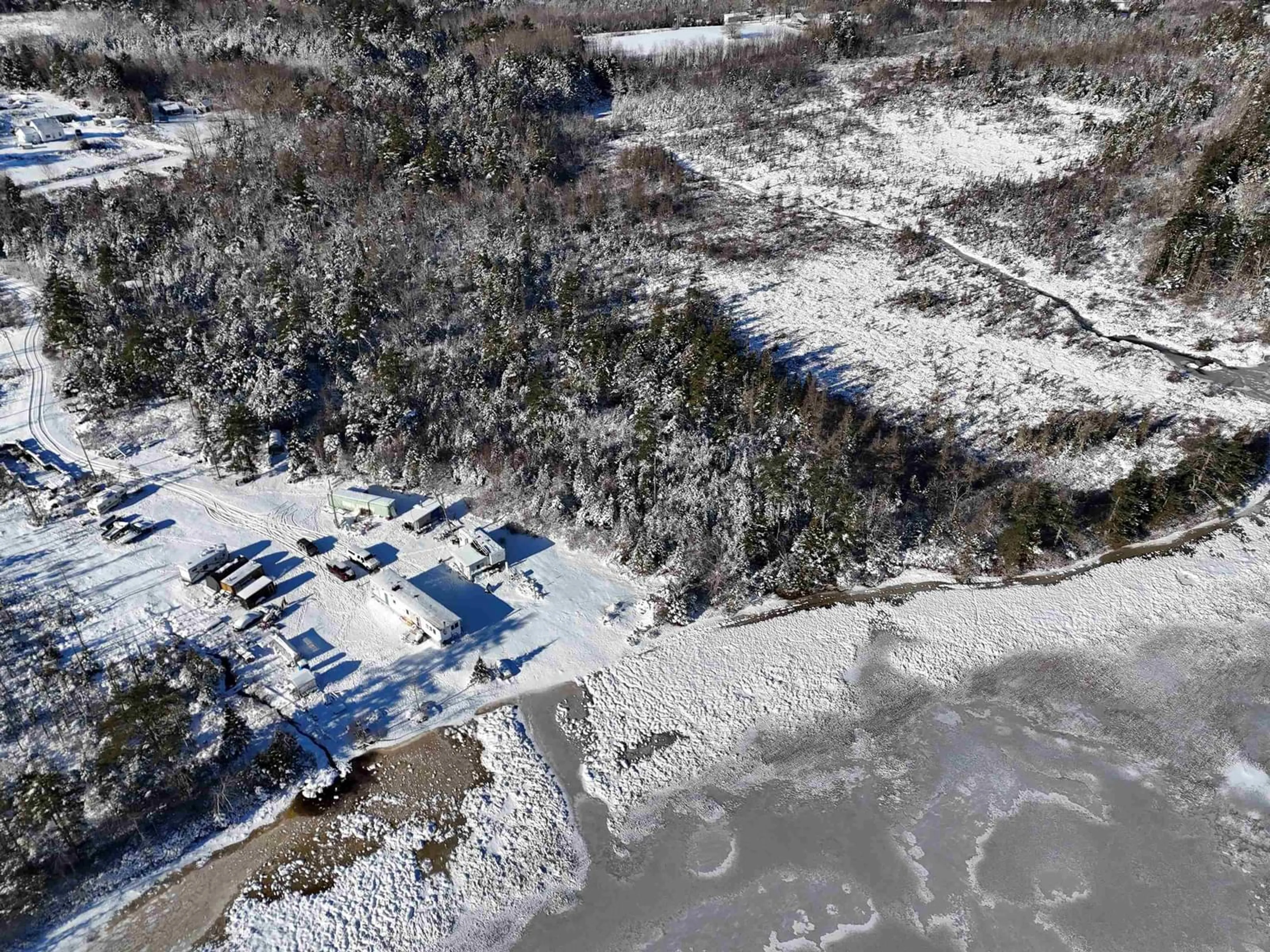 A pic from outside/outdoor area/front of a property/back of a property/a pic from drone, unknown for 73 Somerset Rd, Italy Cross Nova Scotia B4V 0M1