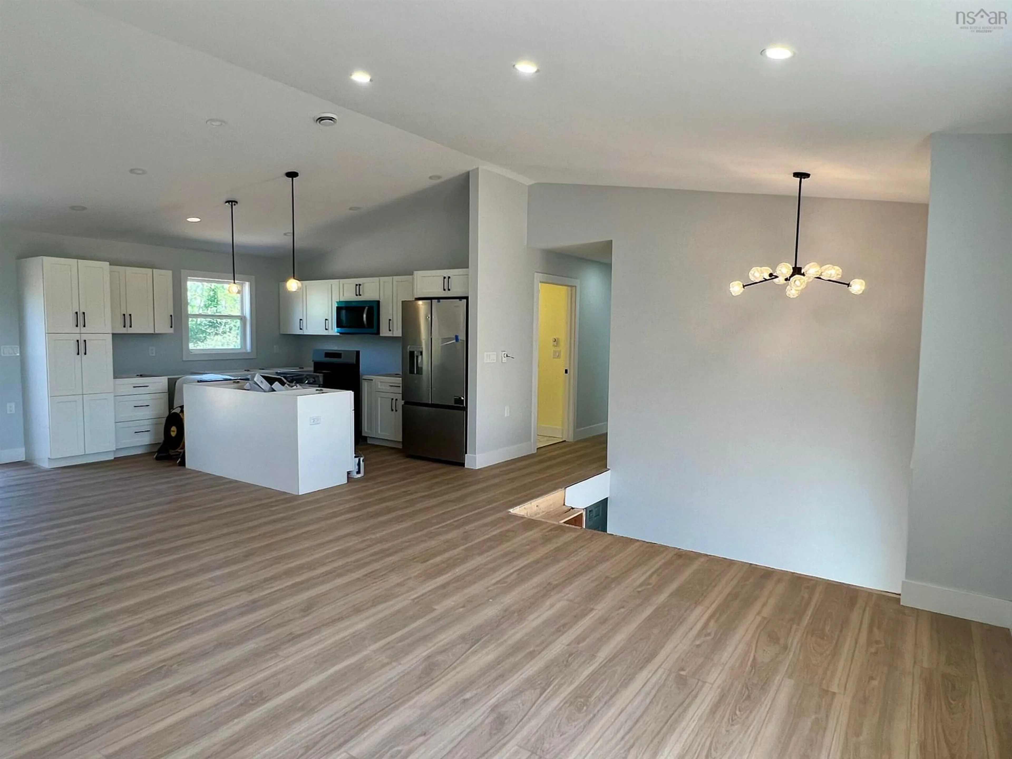Open concept kitchen, wood/laminate floor for 28 Centennial Dr, Abercrombie Nova Scotia B2H 5C6