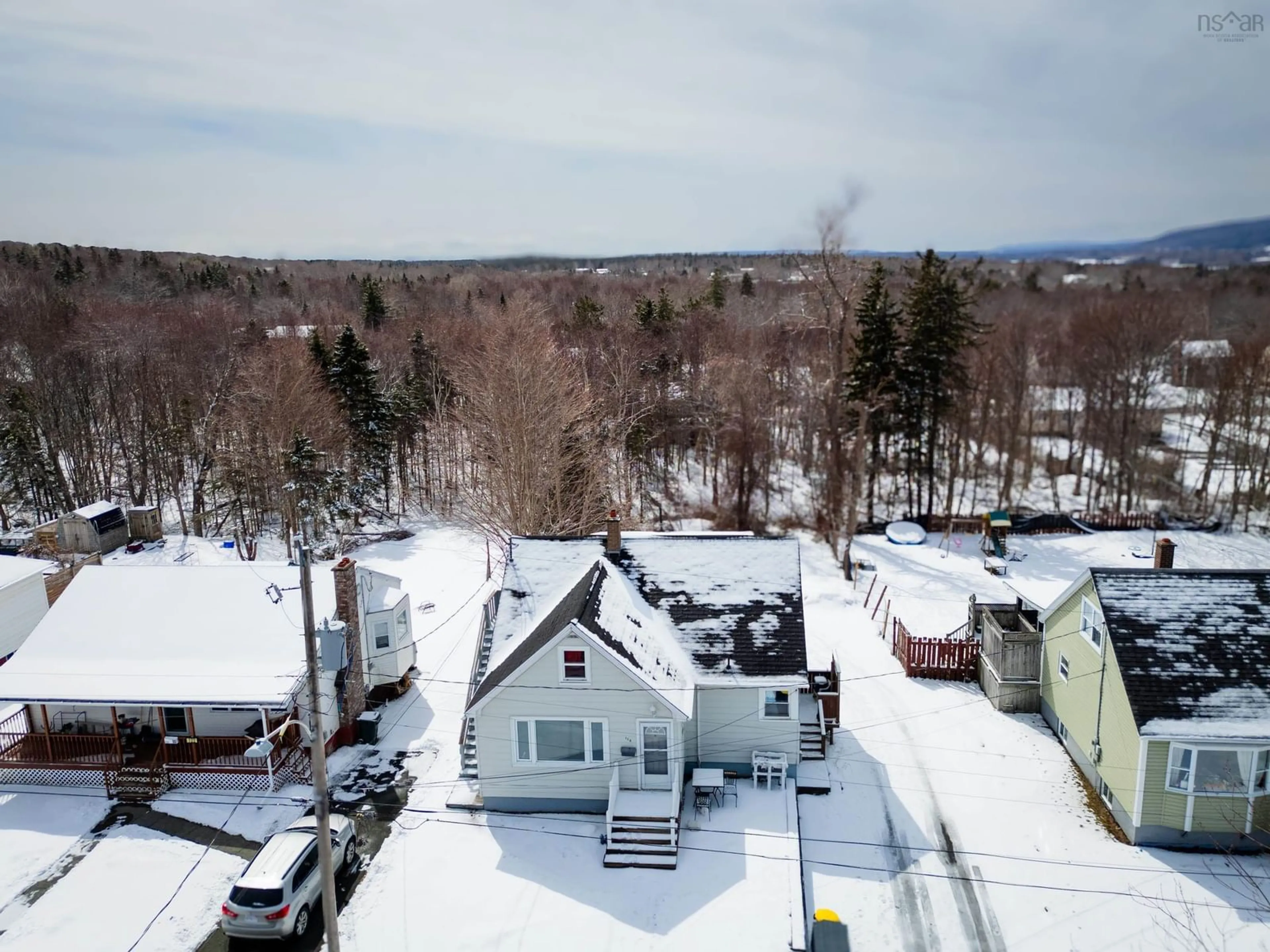 A pic from outside/outdoor area/front of a property/back of a property/a pic from drone, mountain view for 116 Macrae Ave, Sydney River Nova Scotia B1S 1M2