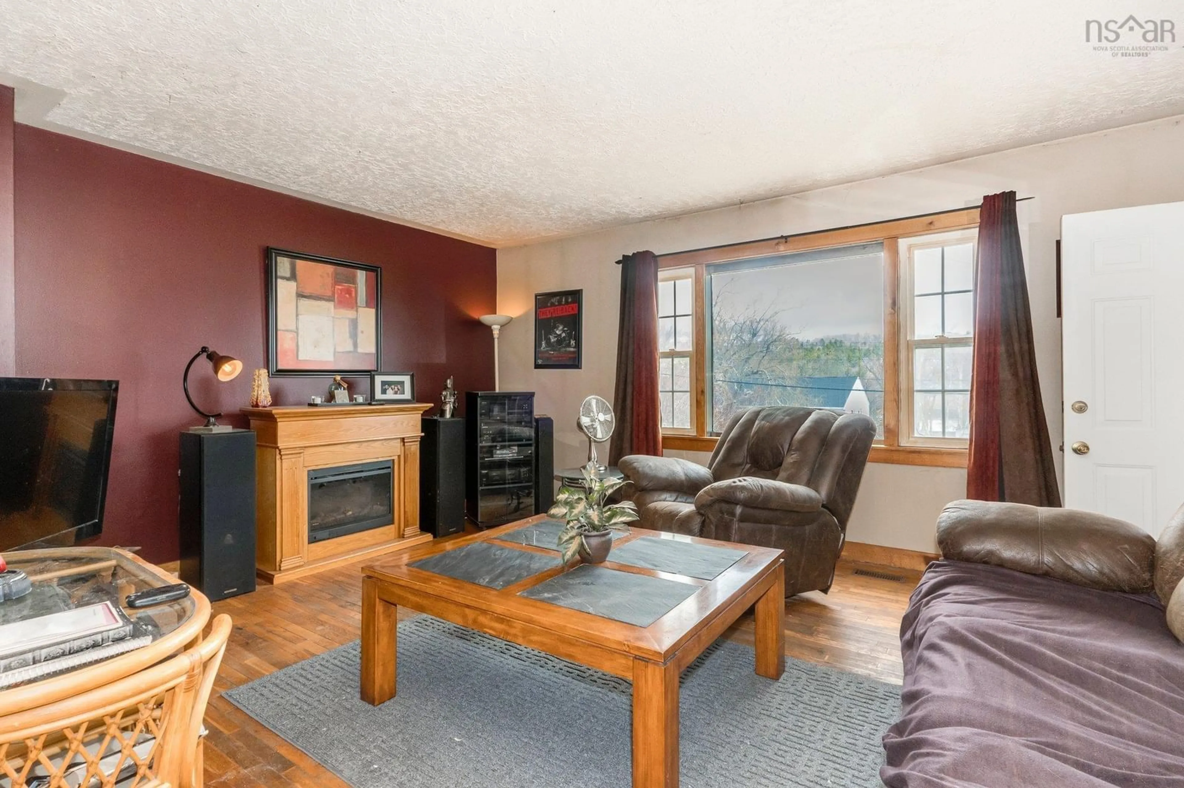 Living room with furniture, wood/laminate floor for 50 Raymond St, Dartmouth Nova Scotia B2X 1B9