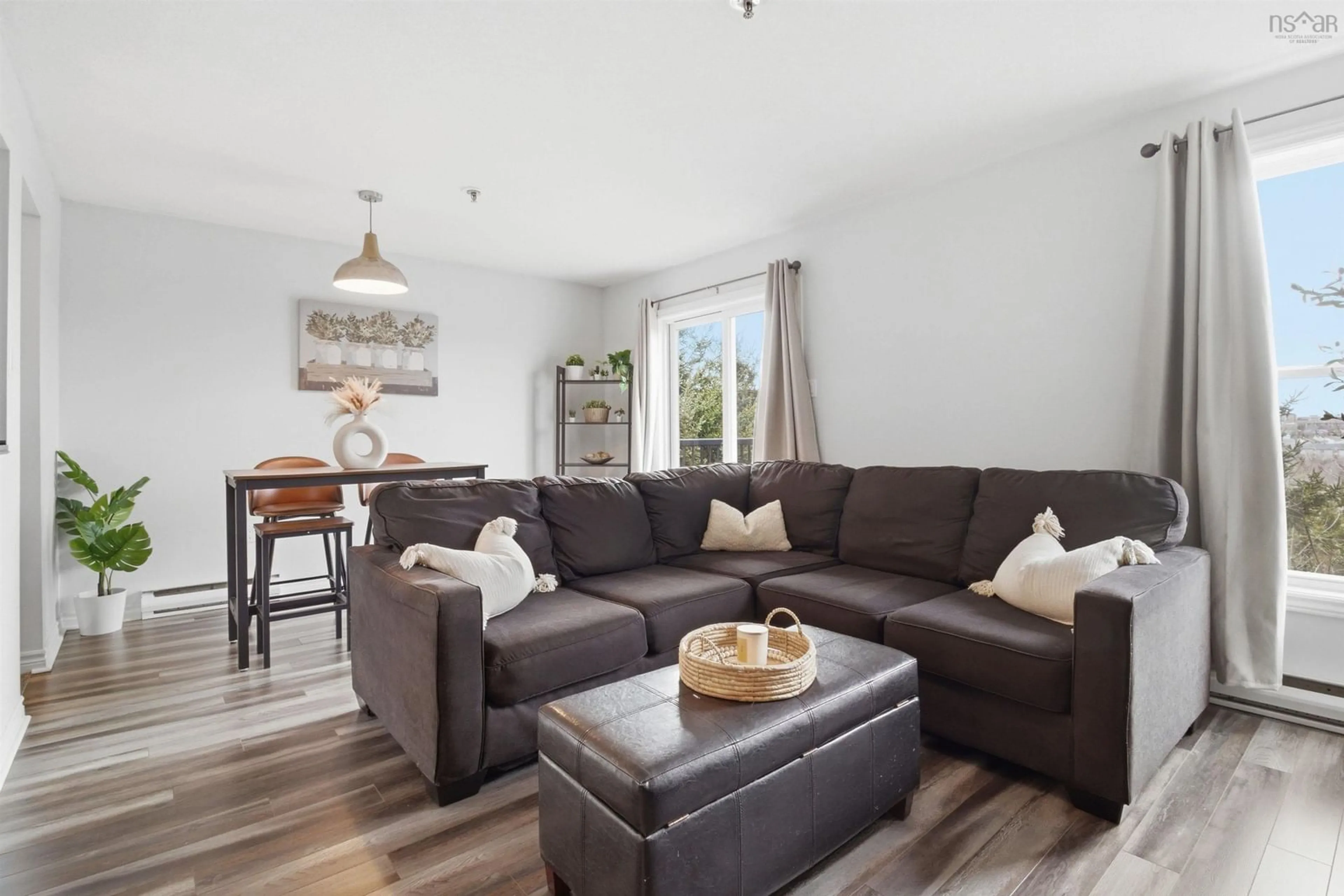 Living room with furniture, wood/laminate floor for 75 Collins Grove #215, Dartmouth Nova Scotia B2W 6B3