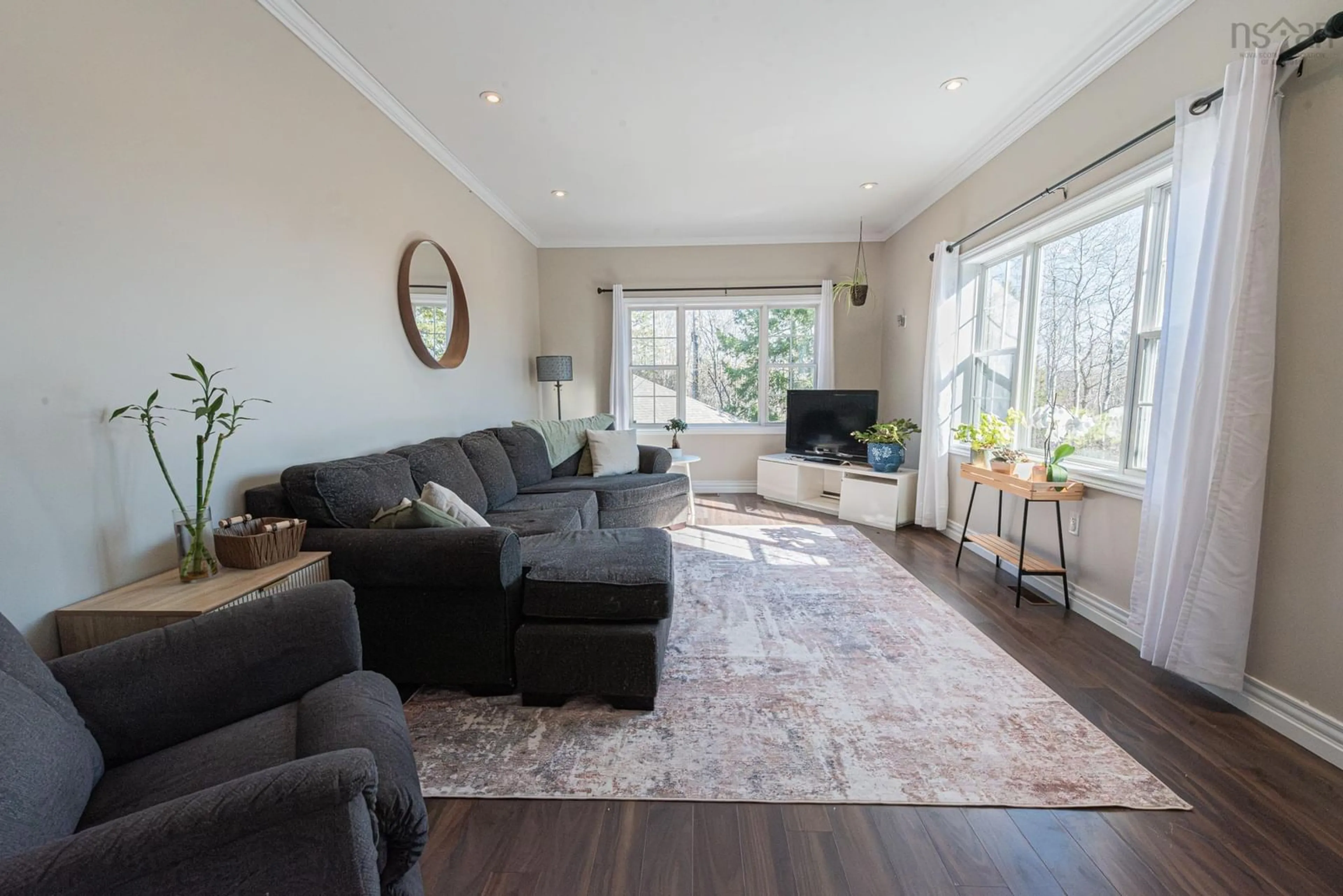 Living room with furniture, wood/laminate floor for 925 Lorne St, Linacy Nova Scotia B2H 4L4