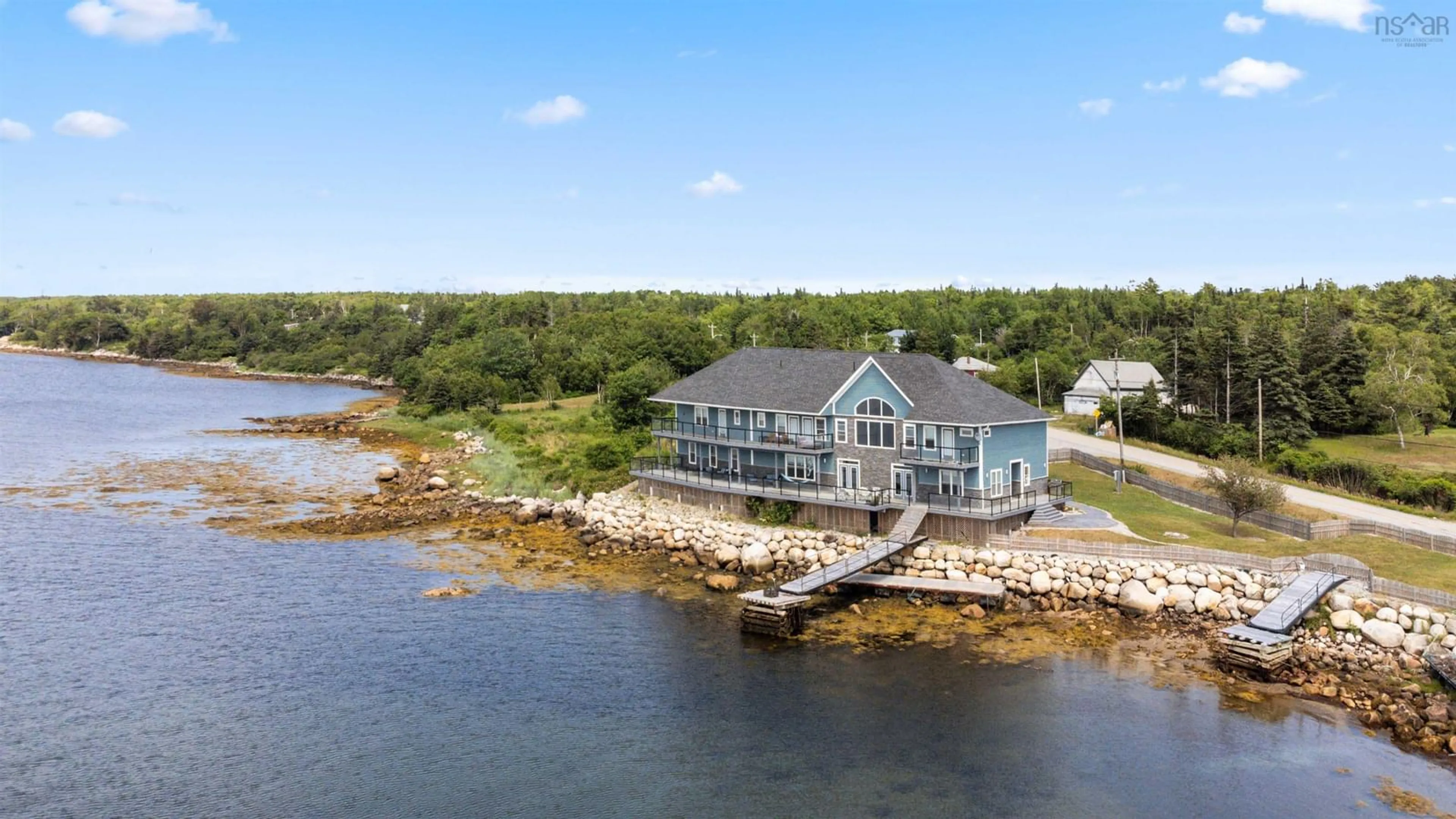 A pic from outside/outdoor area/front of a property/back of a property/a pic from drone, water/lake/river/ocean view for 1112,1121+Lot39 Sandy Point Rd, Sandy Point Nova Scotia B0T 1W0