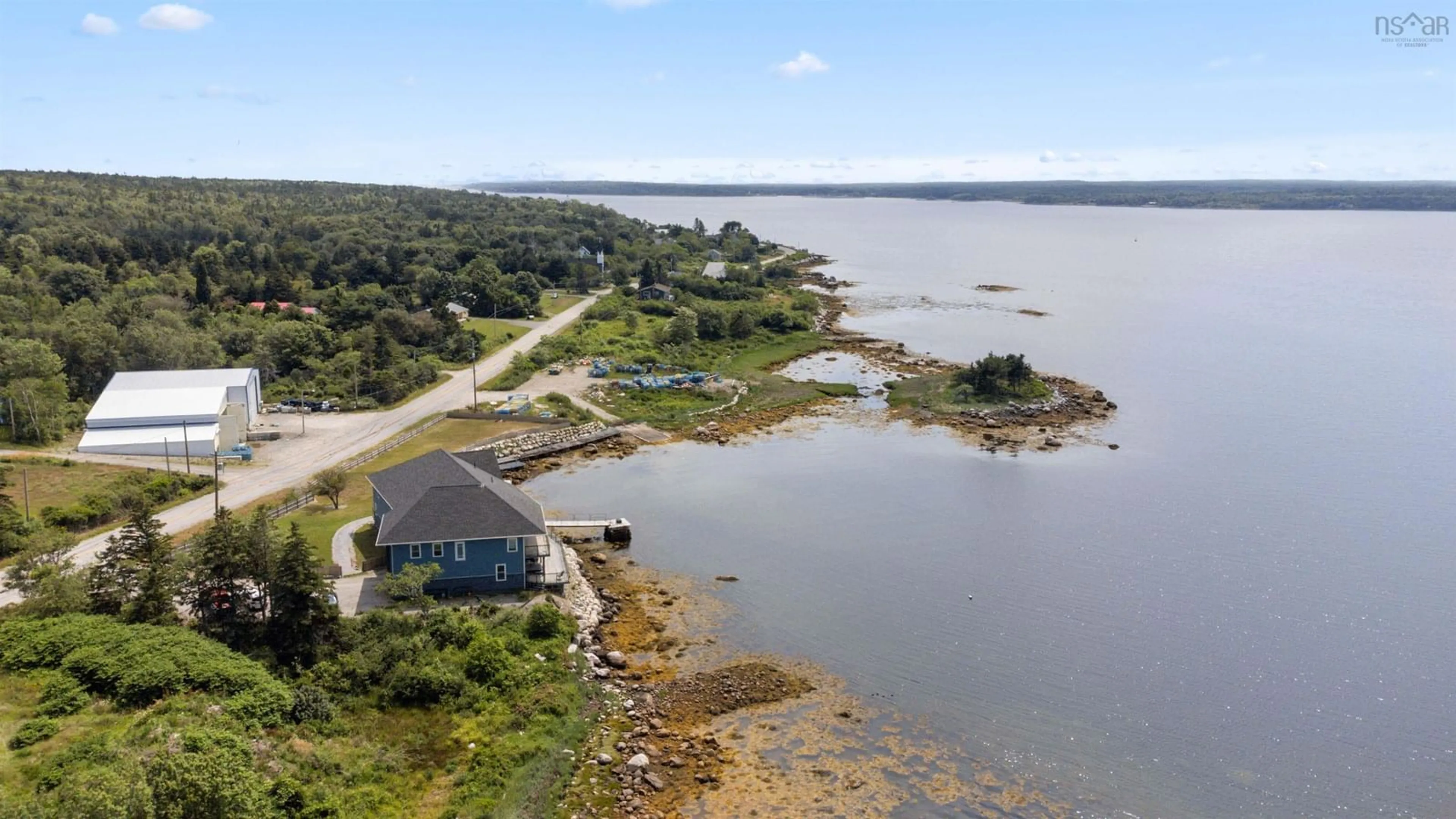 A pic from outside/outdoor area/front of a property/back of a property/a pic from drone, water/lake/river/ocean view for 1112,1121+Lot39 Sandy Point Rd, Sandy Point Nova Scotia B0T 1W0