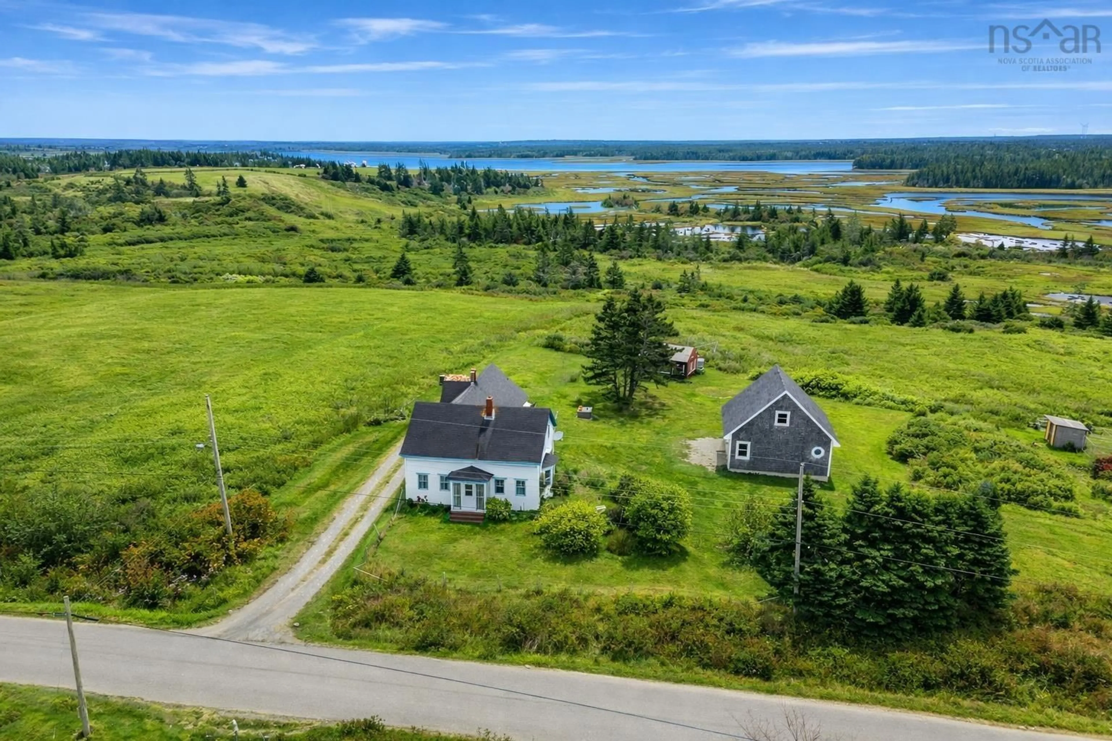A pic from outside/outdoor area/front of a property/back of a property/a pic from drone, water/lake/river/ocean view for 129 Chebogue Point Rd, Rockville Nova Scotia B5A 5E8