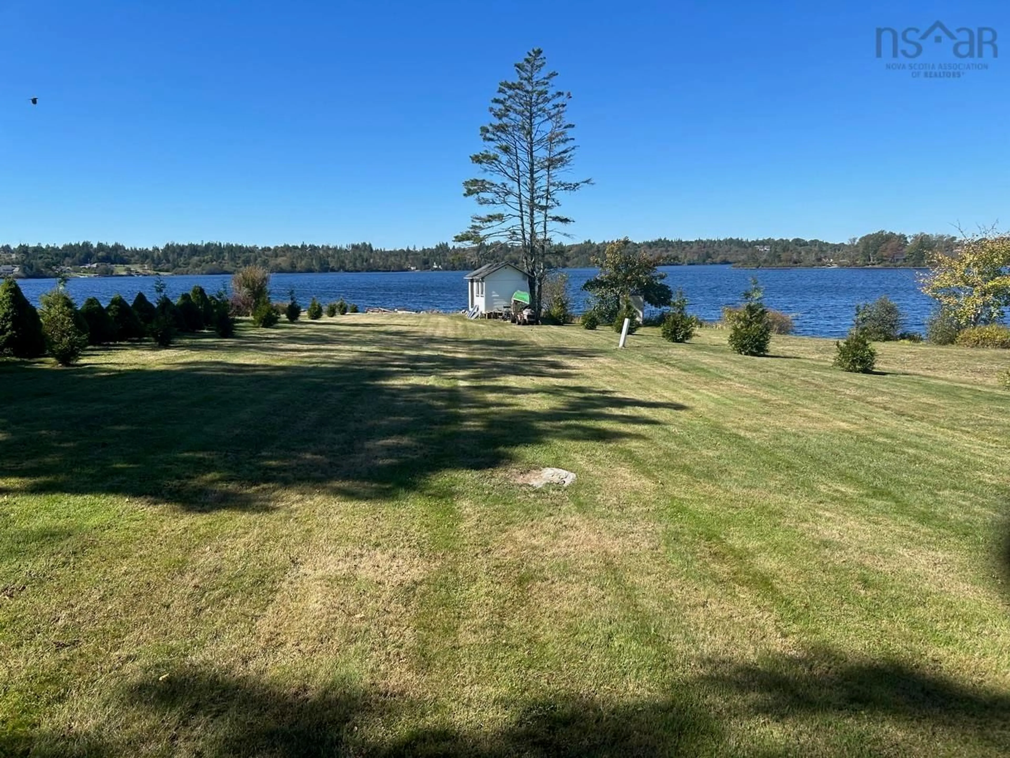 A pic from outside/outdoor area/front of a property/back of a property/a pic from drone, water/lake/river/ocean view for 727 Highway 1, Hebron Nova Scotia B5A 5Z5