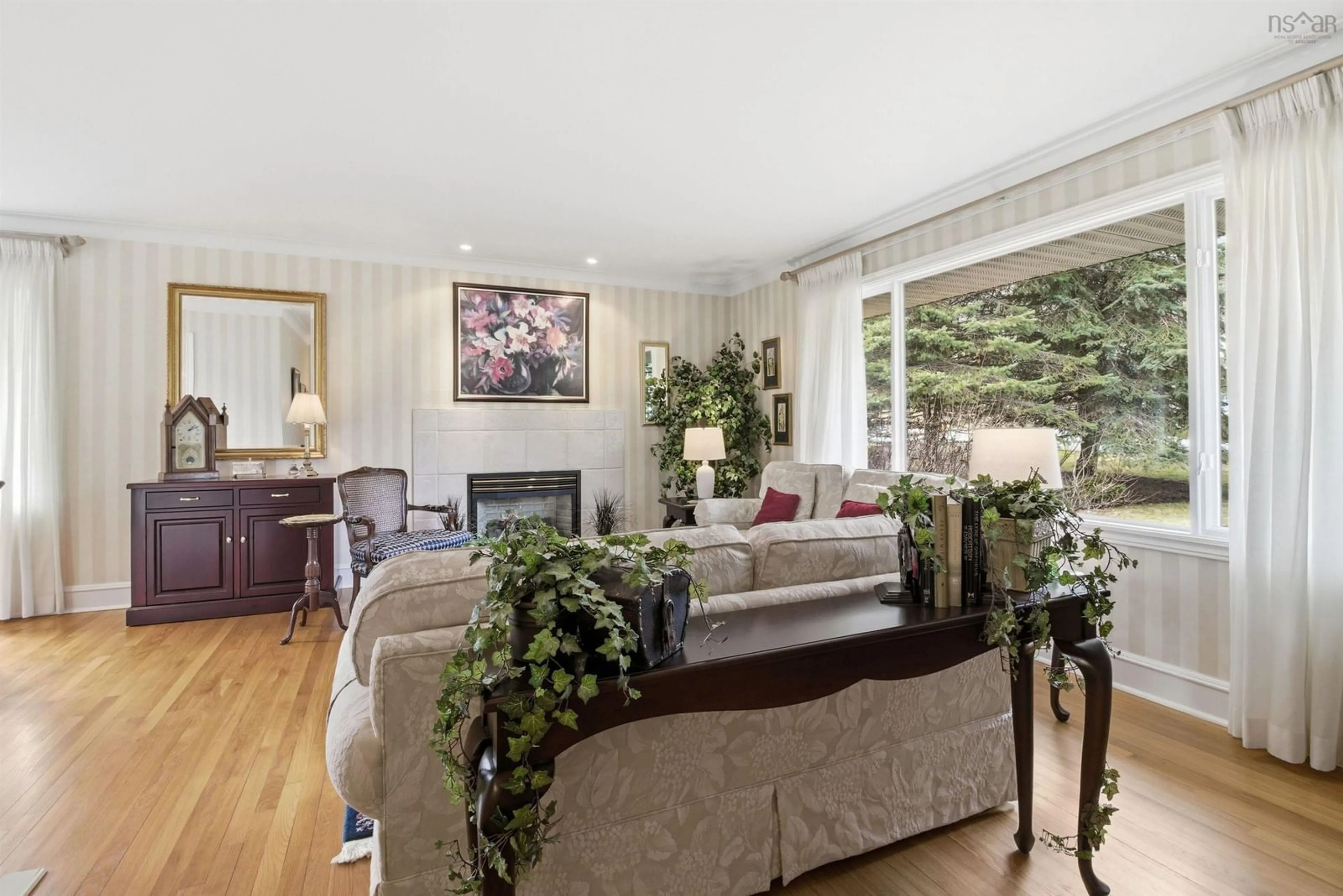 Living room with furniture, wood/laminate floor for 22 Donaldson Ave, Wedgewood Nova Scotia B3M 3B5