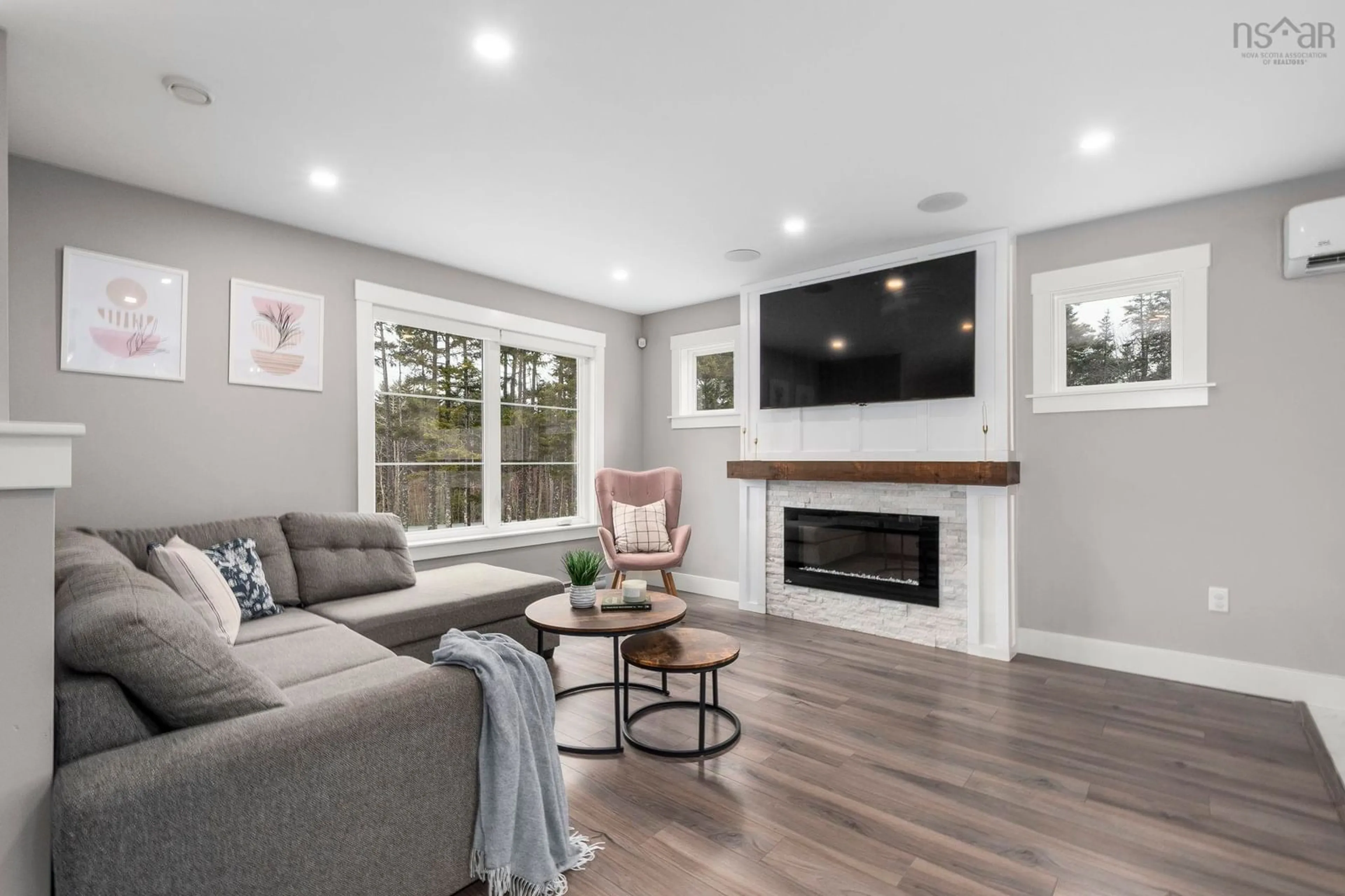 Living room with furniture, wood/laminate floor for 721 Midnight Run, Middle Sackville Nova Scotia B4E 0R3