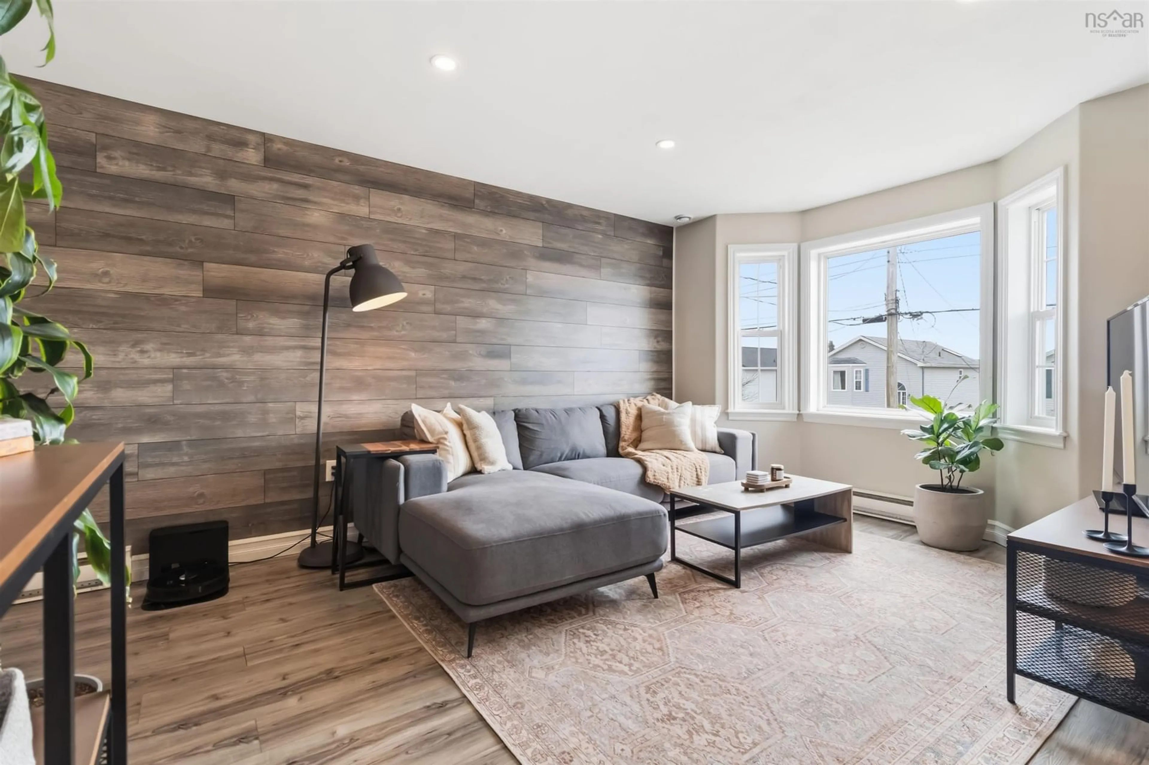 Living room with furniture, wood/laminate floor for 131 Serop Cres, Eastern Passage Nova Scotia B3G 1P8