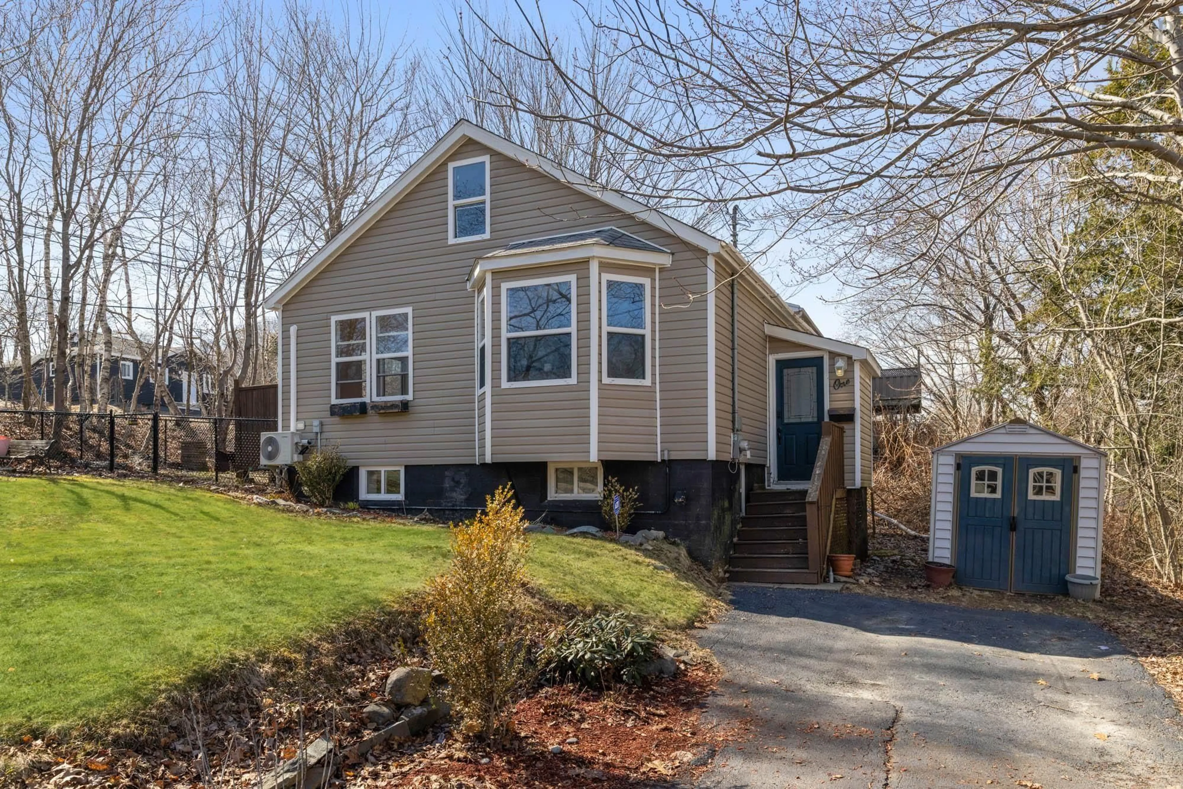 Home with vinyl exterior material, street for 1 Maple Dr, Dartmouth Nova Scotia B2X 1C1