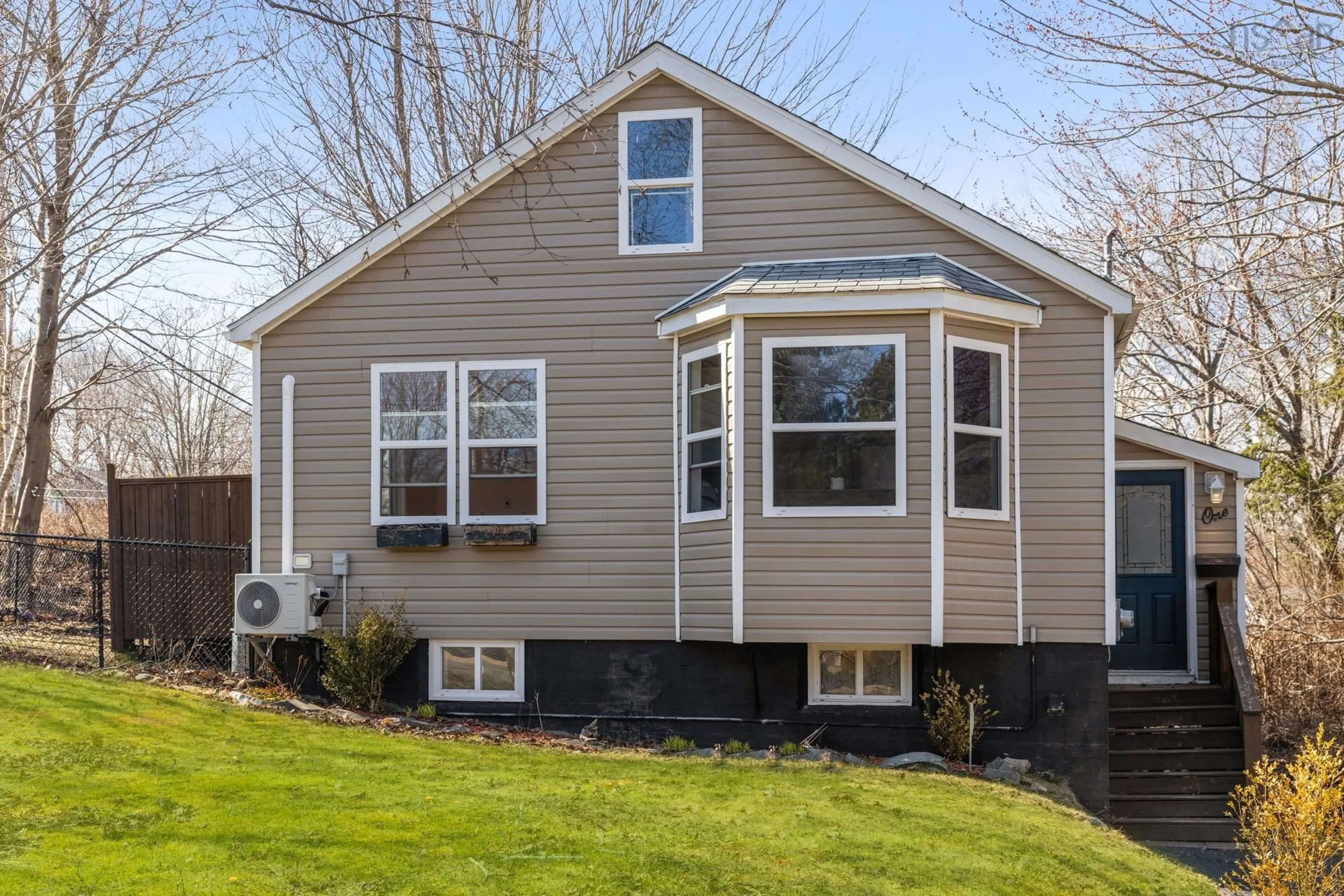 Home with vinyl exterior material, street for 1 Maple Dr, Dartmouth Nova Scotia B2X 1C1