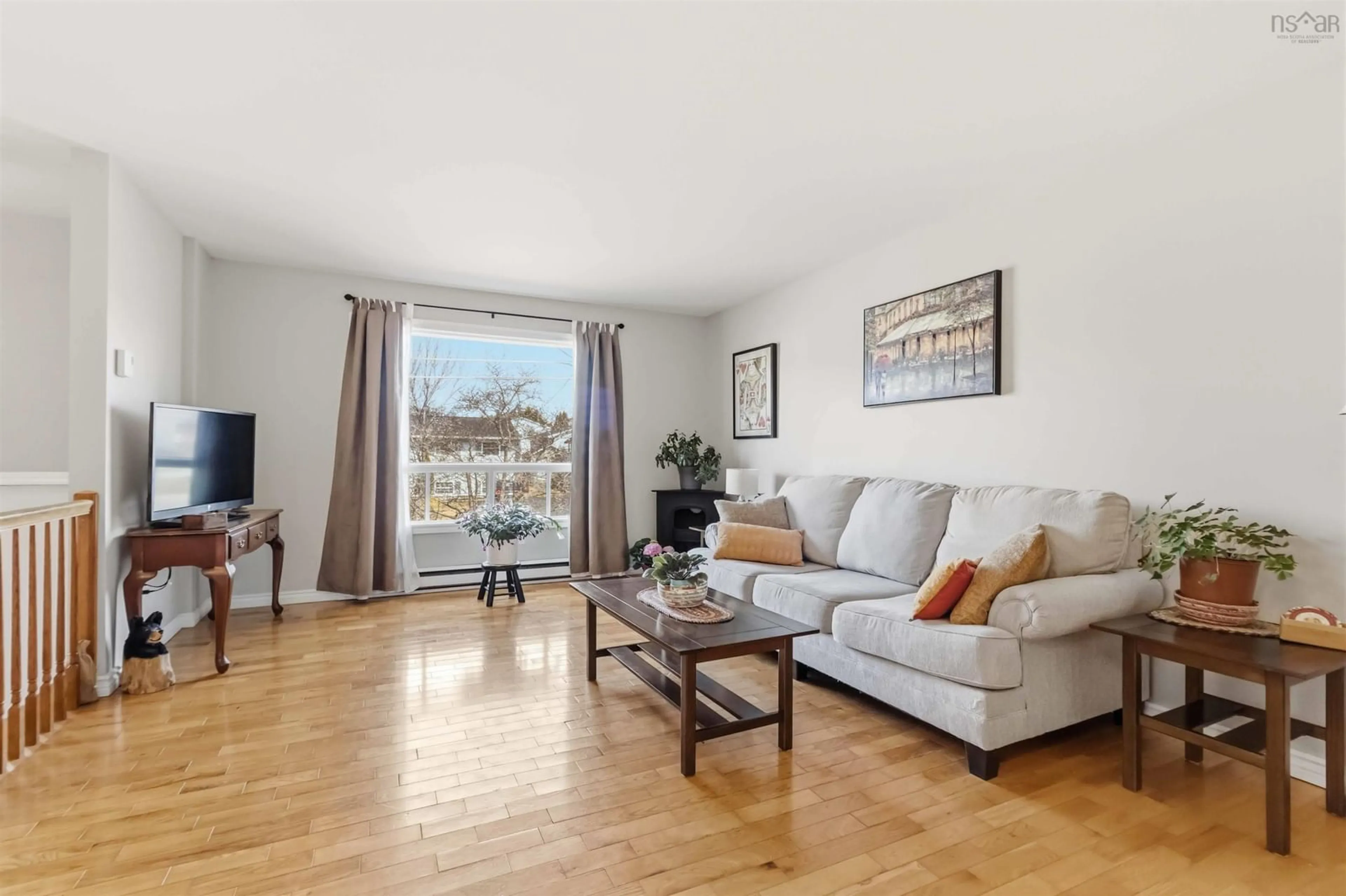 Living room with furniture, wood/laminate floor for 28 Merrimac Dr, Cole Harbour Nova Scotia B2W 4P8
