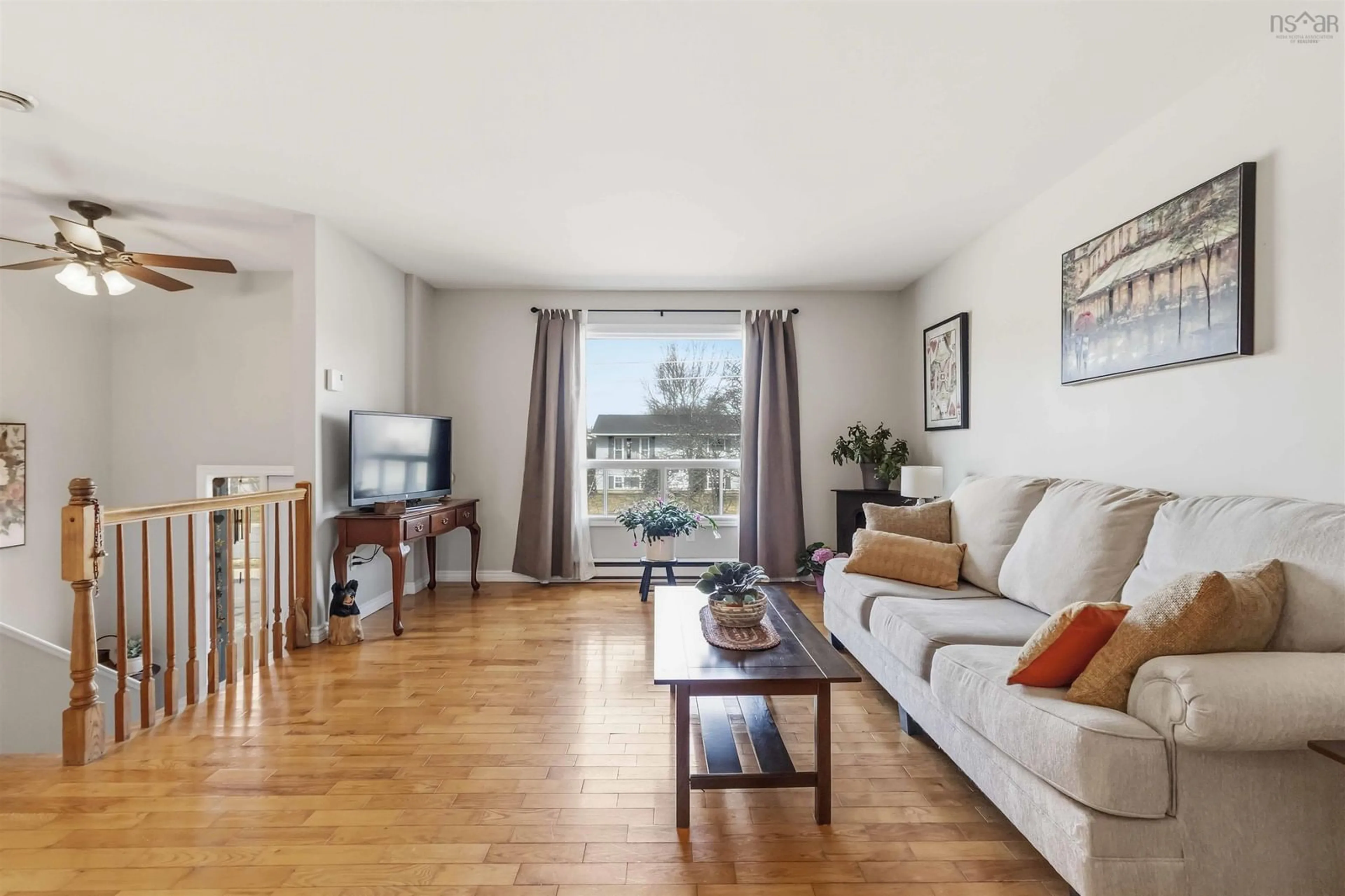 Living room with furniture, wood/laminate floor for 28 Merrimac Dr, Cole Harbour Nova Scotia B2W 4P8