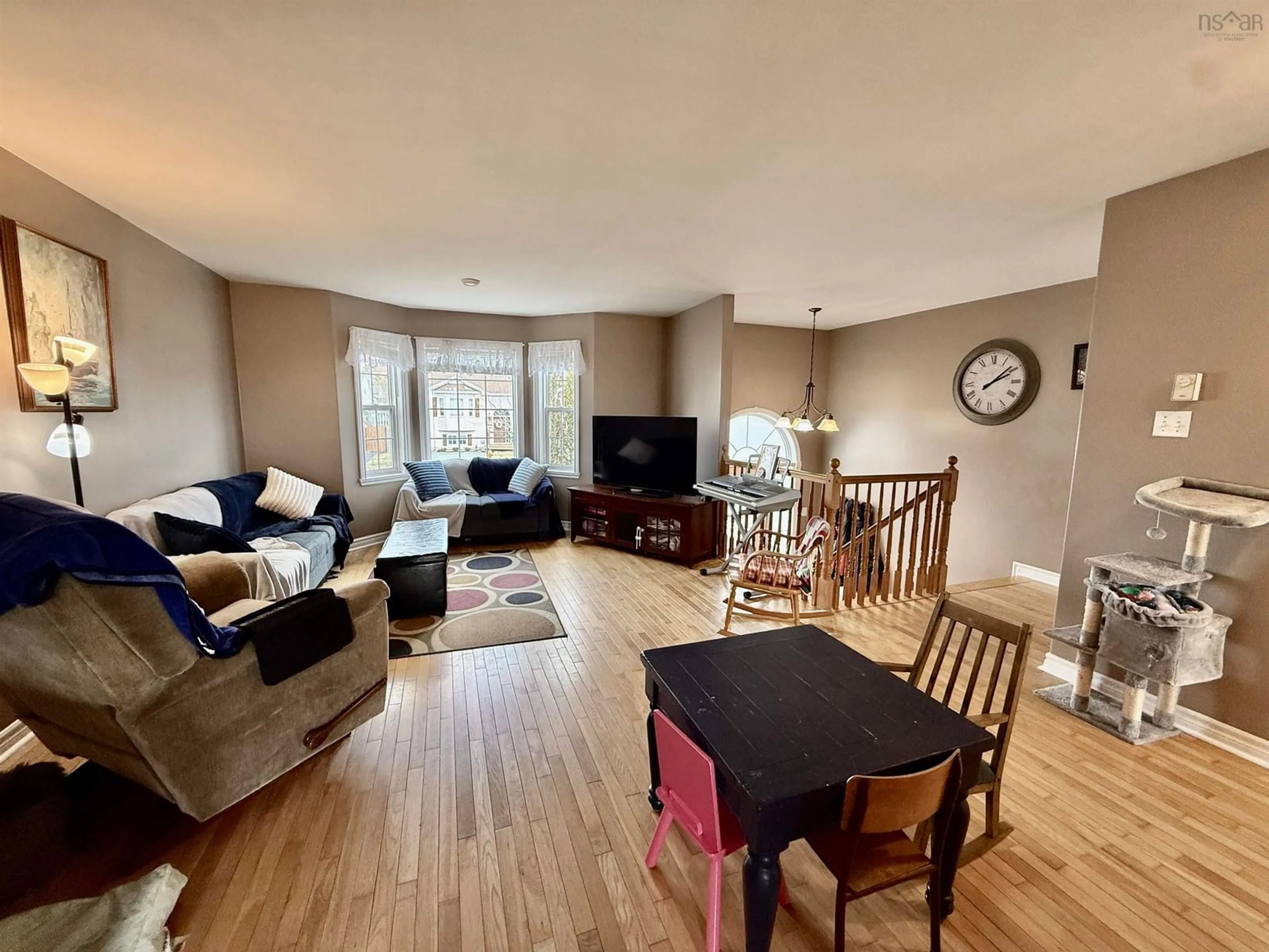 Living room with furniture, wood/laminate floor for 45 Peter Crt, Eastern Passage Nova Scotia B3G 1S9