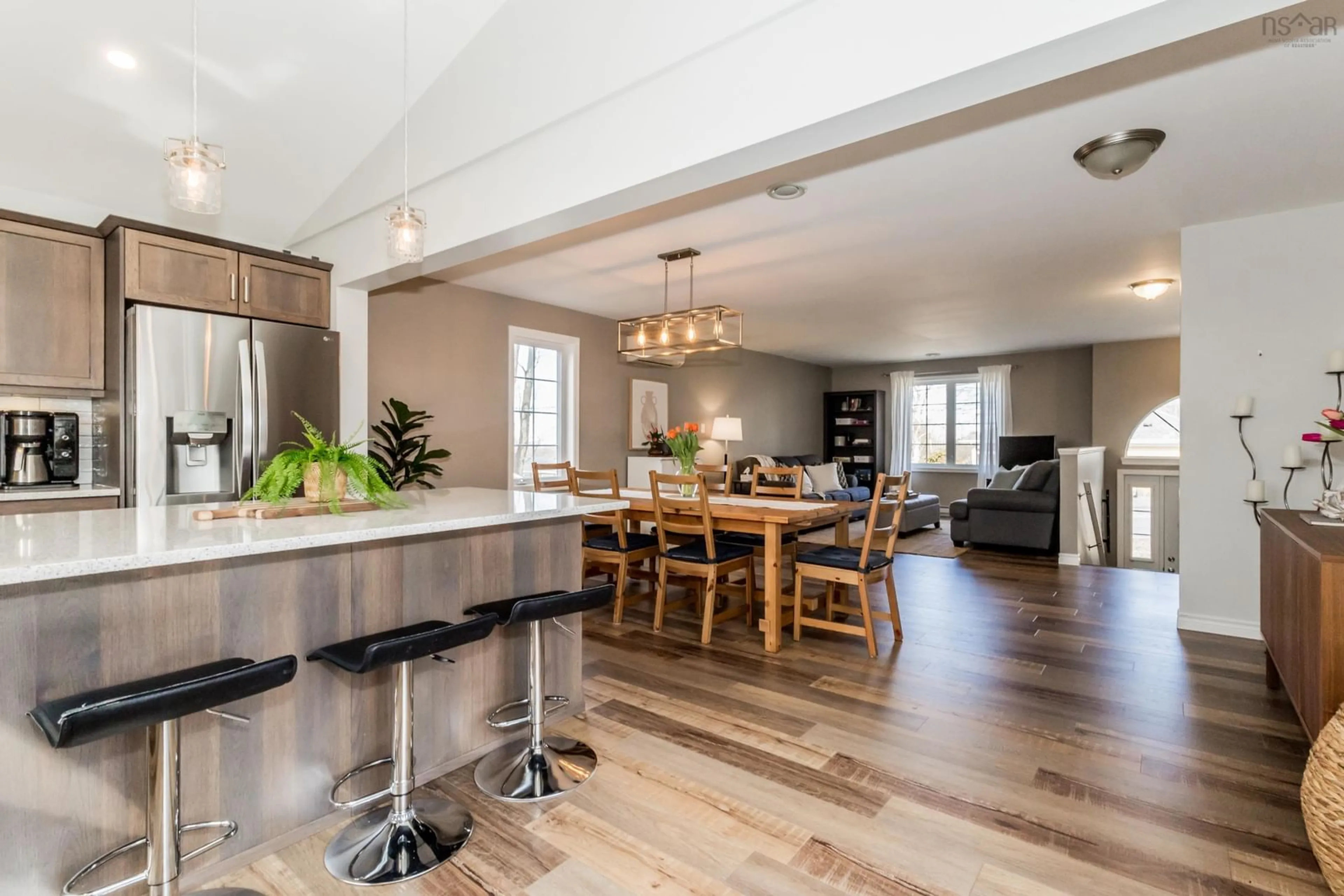 Open concept kitchen, wood/laminate floor for 26 Kent Ave, Wolfville Nova Scotia B4P 1V1