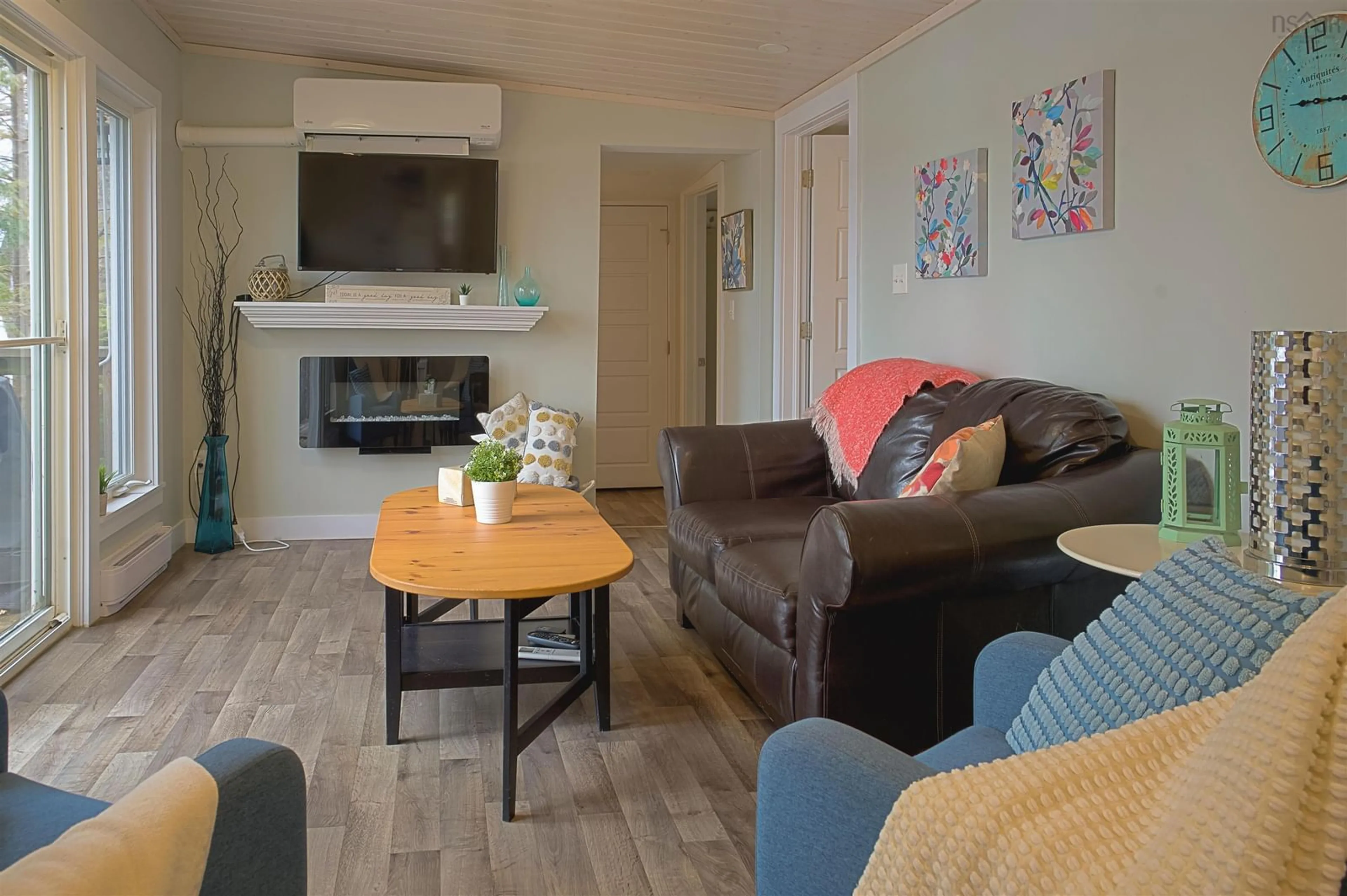 Living room with furniture, wood/laminate floor for 36 Summer Lane, Wile Settlement Nova Scotia B0N 2T0