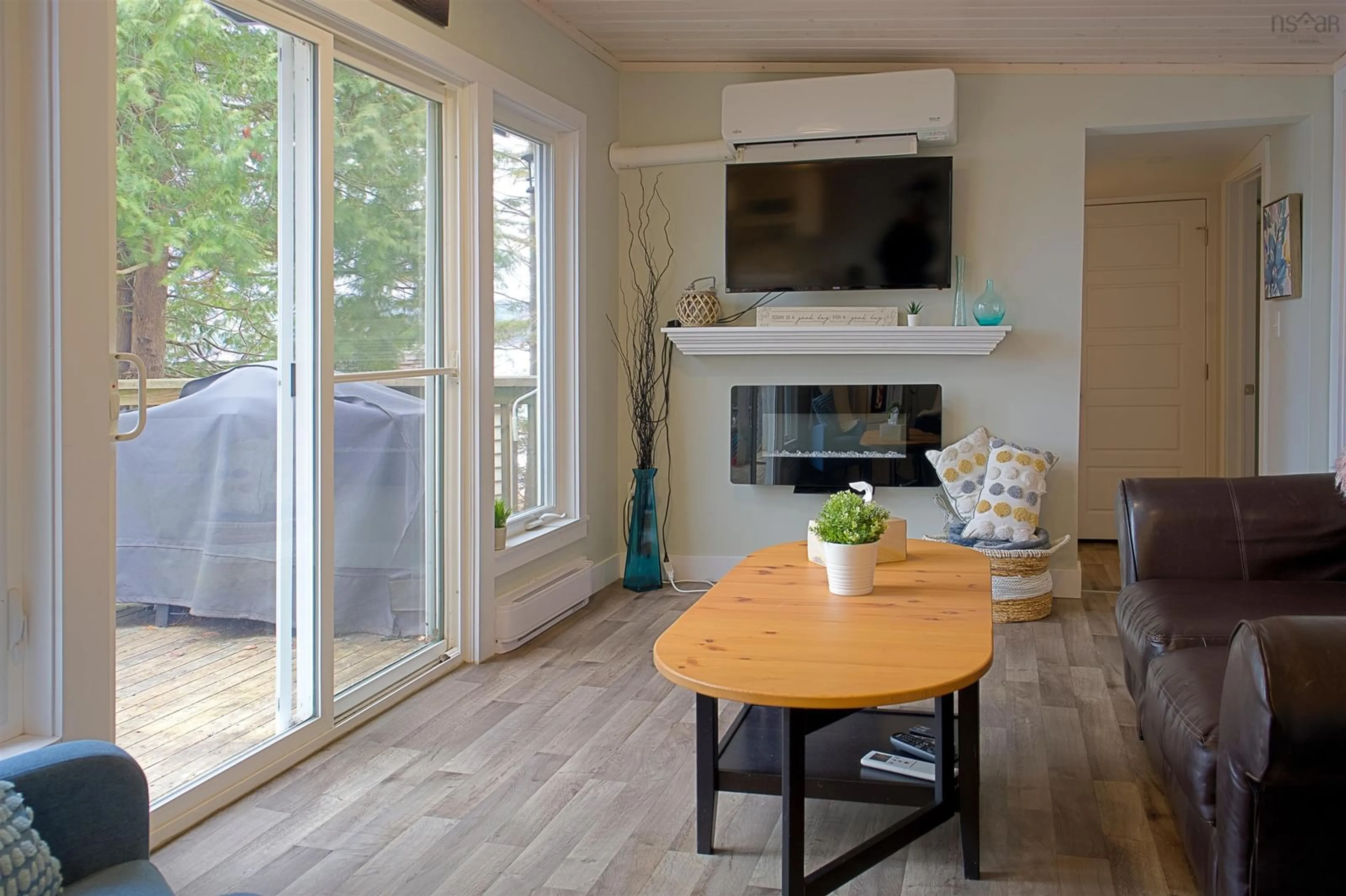 Living room with furniture, wood/laminate floor for 36 Summer Lane, Wile Settlement Nova Scotia B0N 2T0