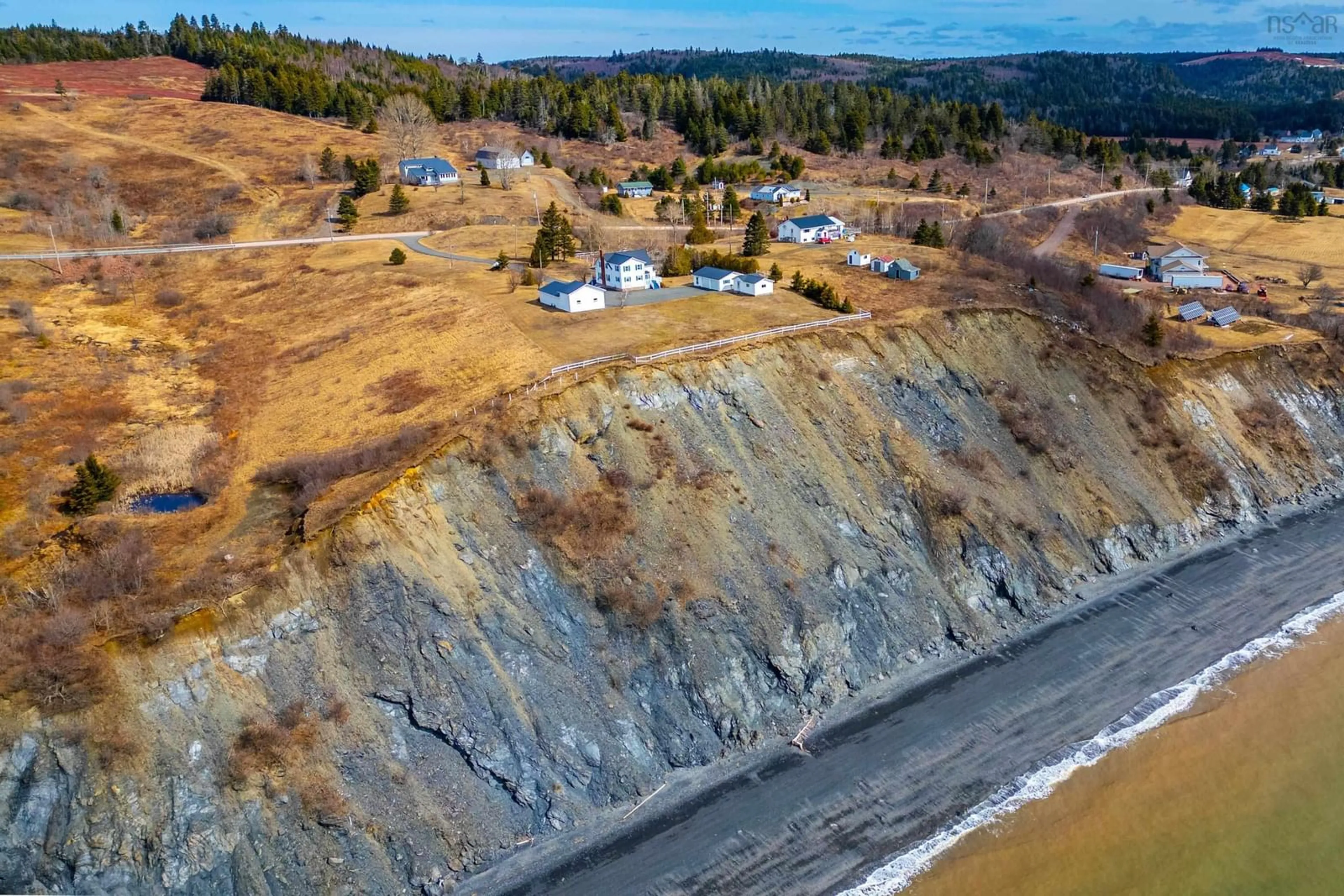 A pic from outside/outdoor area/front of a property/back of a property/a pic from drone, water/lake/river/ocean view for 8002 Highway 209, Wards Brook Nova Scotia B0M 1S0