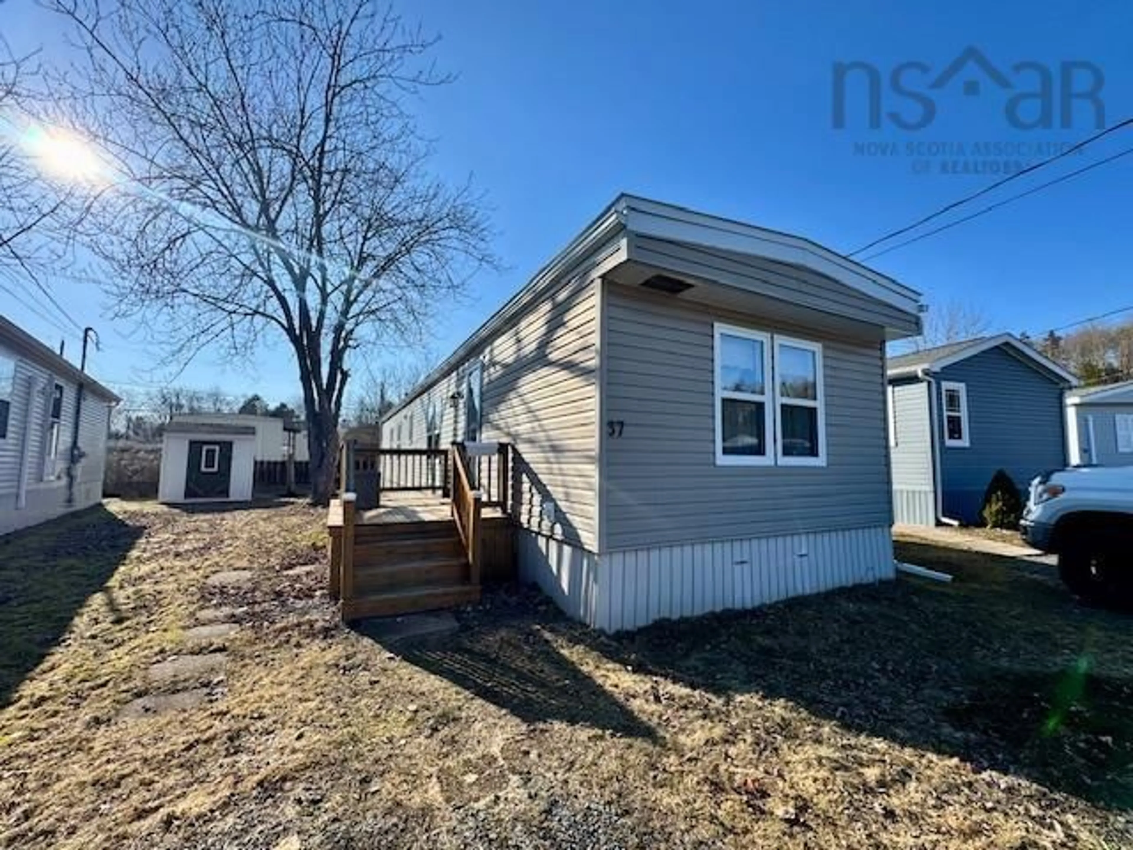 Home with vinyl exterior material, street for 37 Brook Cres, Middle Sackville Nova Scotia B4E 1C3