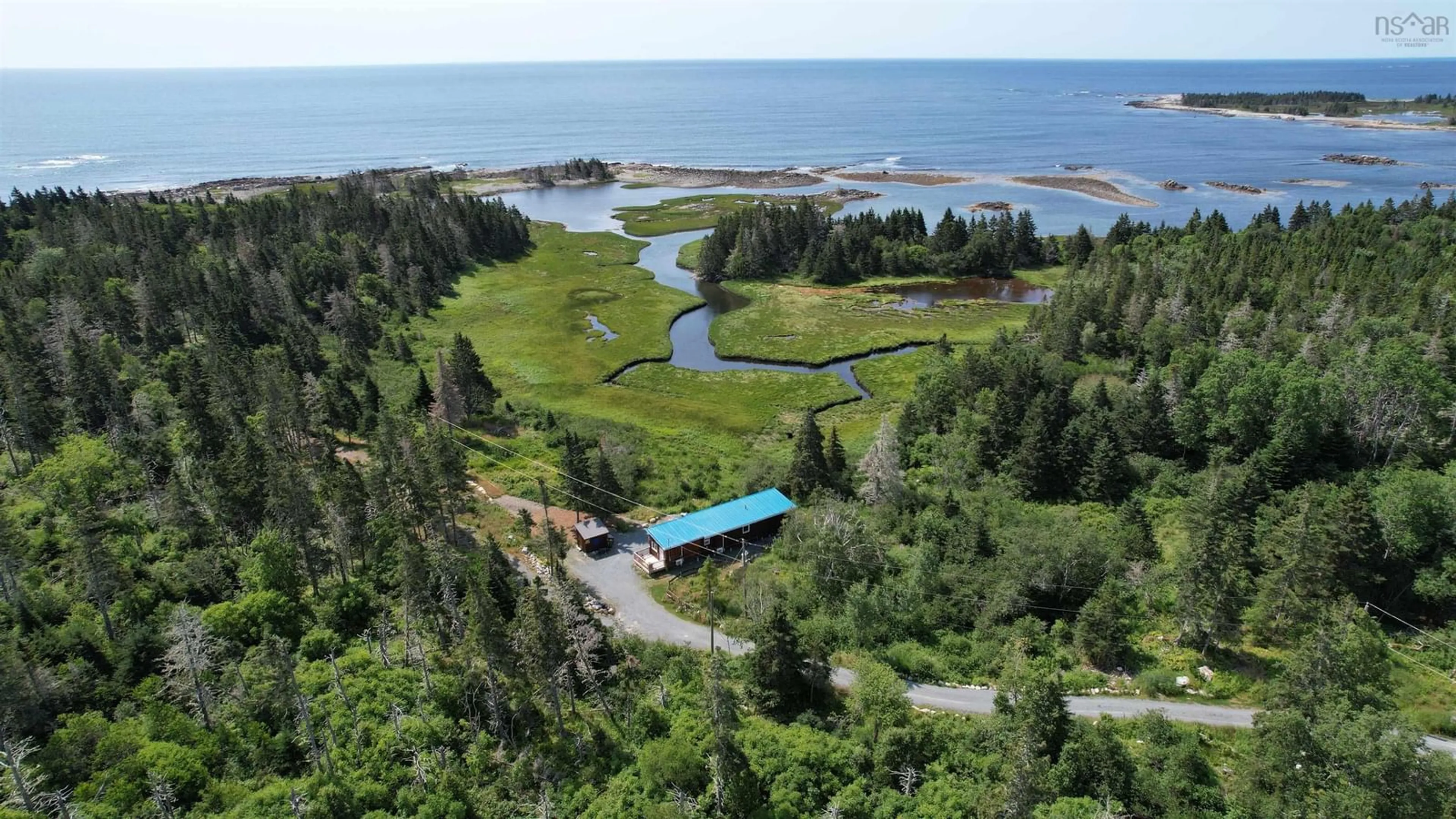 A pic from outside/outdoor area/front of a property/back of a property/a pic from drone, water/lake/river/ocean view for 7741 Highway 331, Cherry Hill Nova Scotia B0J 2H0