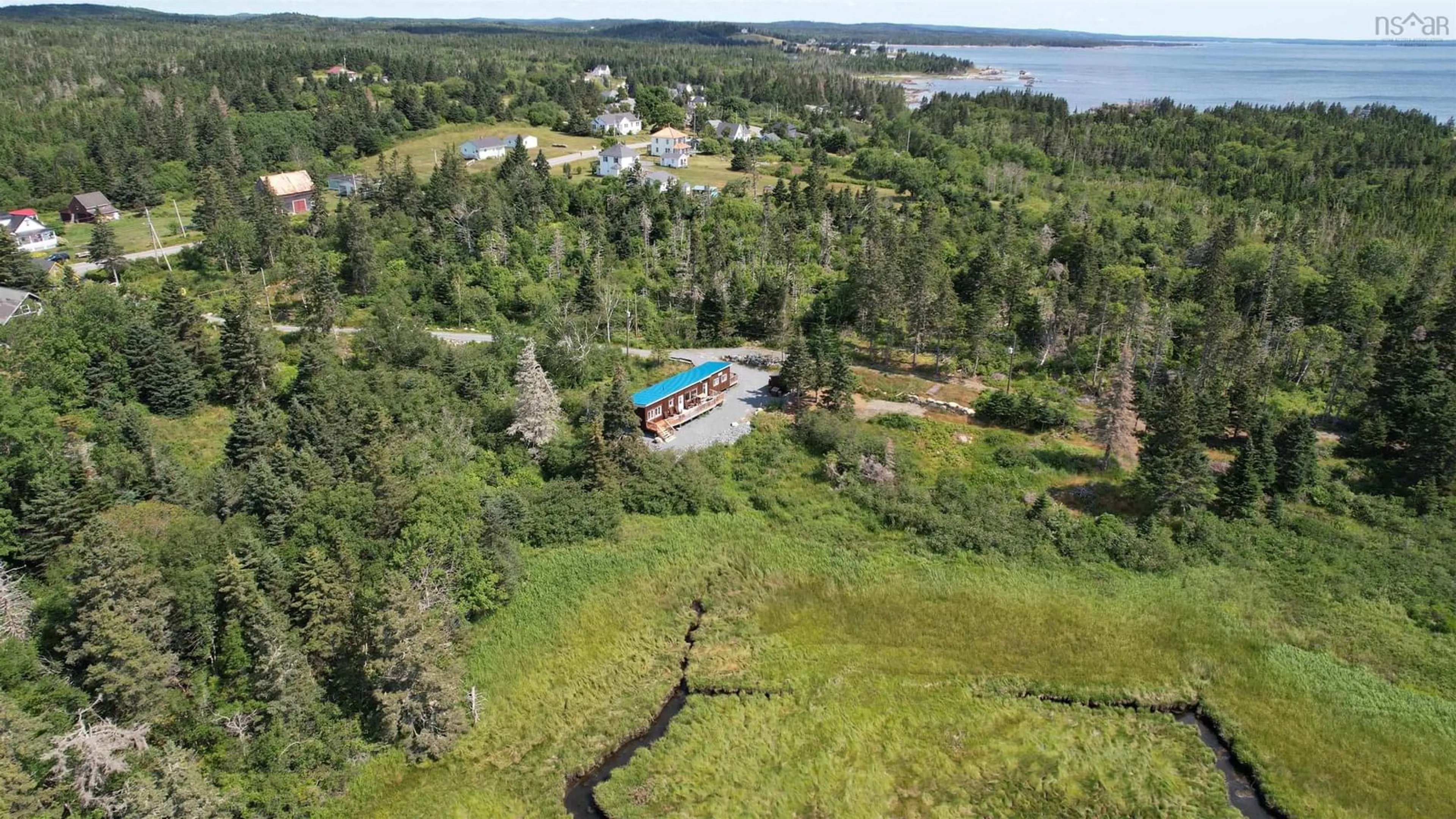 A pic from outside/outdoor area/front of a property/back of a property/a pic from drone, water/lake/river/ocean view for 7741 Highway 331, Cherry Hill Nova Scotia B0J 2H0