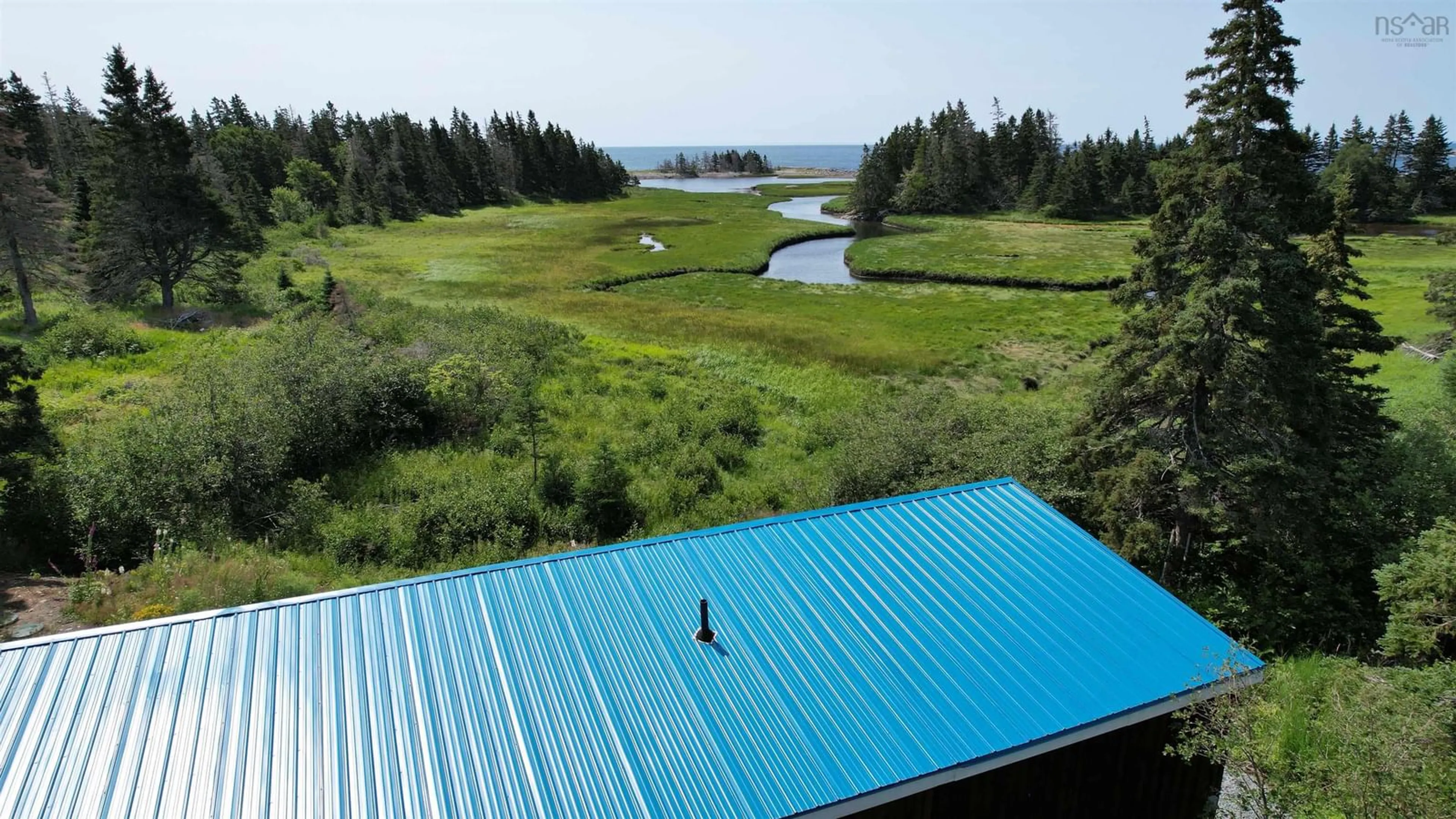 A pic from outside/outdoor area/front of a property/back of a property/a pic from drone, water/lake/river/ocean view for 7741 Highway 331, Cherry Hill Nova Scotia B0J 2H0