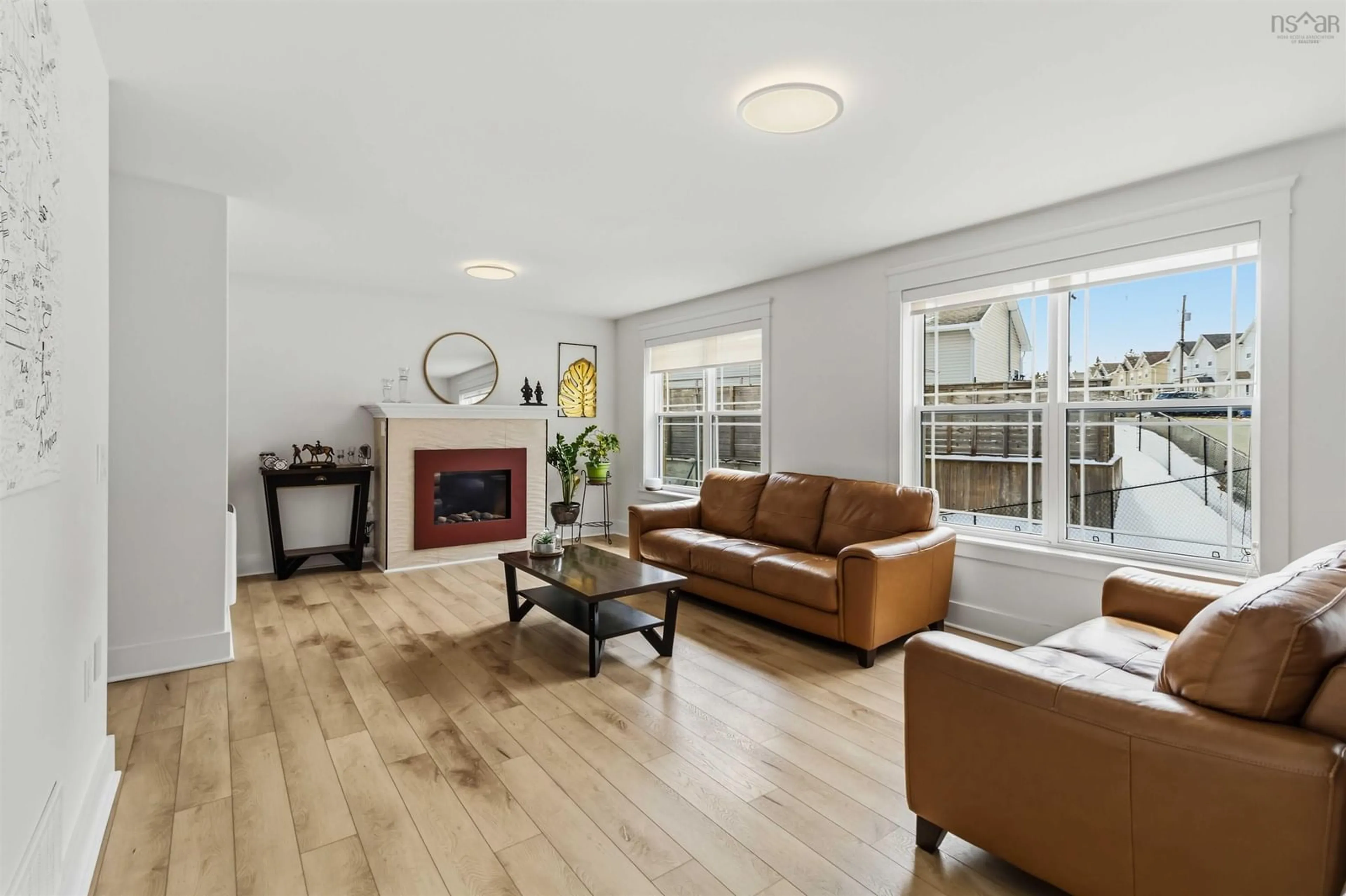 Living room with furniture, wood/laminate floor for 6 Riverwood Dr, Timberlea Nova Scotia B3T 0B1