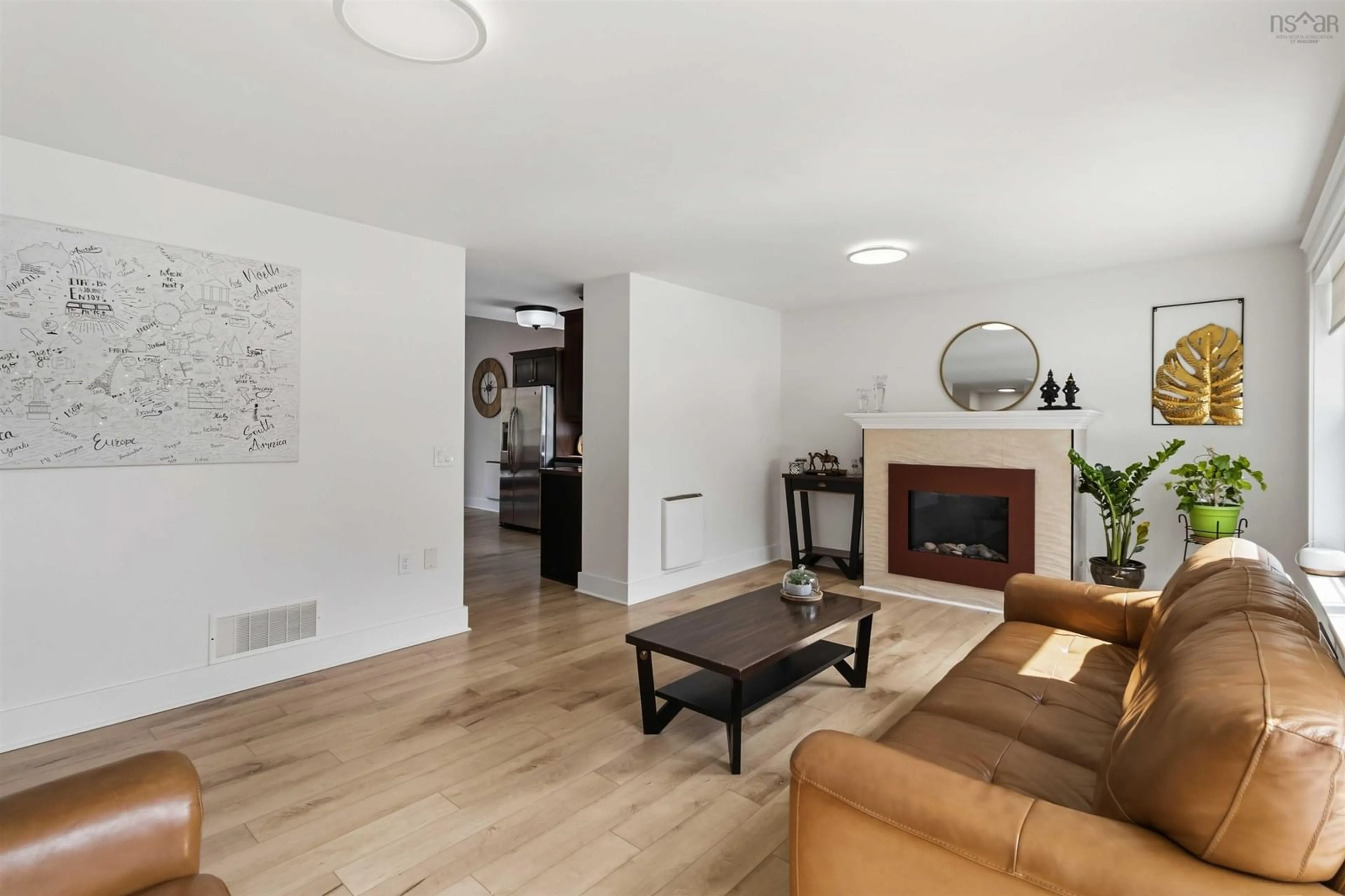 Living room with furniture, wood/laminate floor for 6 Riverwood Dr, Timberlea Nova Scotia B3T 0B1