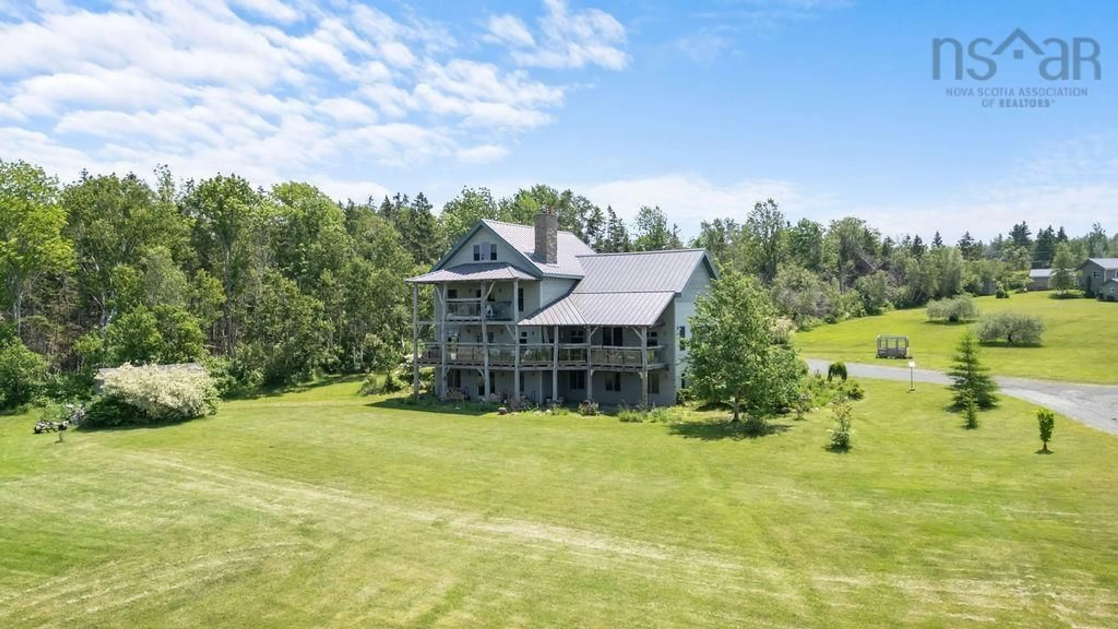 A pic from outside/outdoor area/front of a property/back of a property/a pic from drone, water/lake/river/ocean view for 65 Meadow Breeze Lane, Kings Head Nova Scotia B2H 5C4