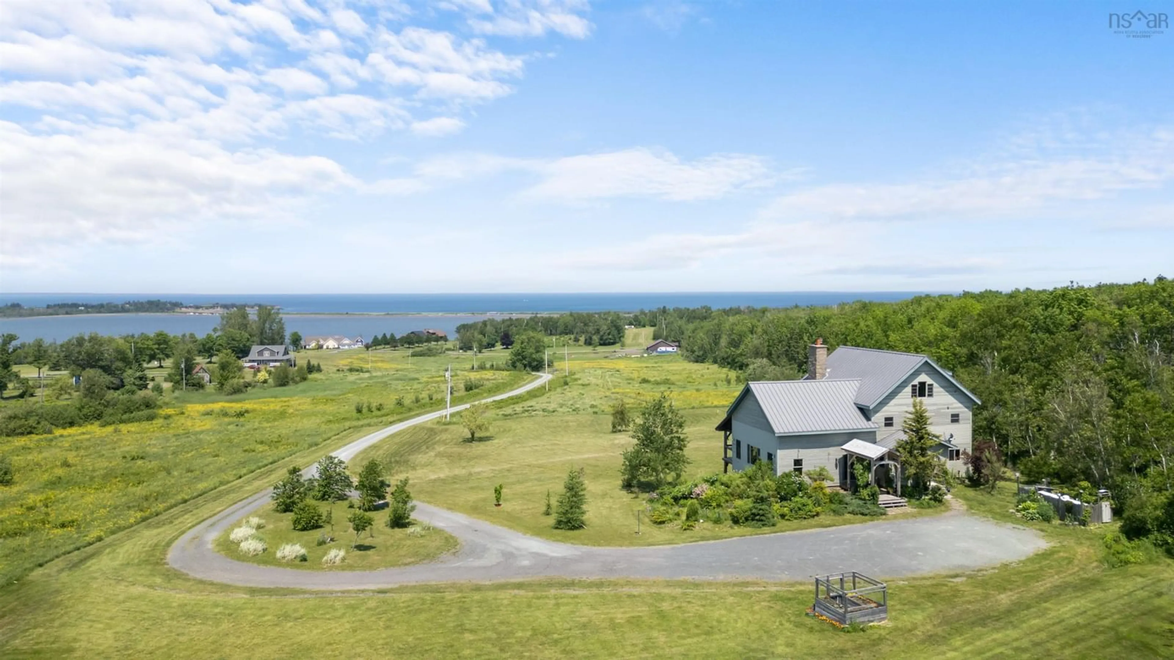 A pic from outside/outdoor area/front of a property/back of a property/a pic from drone, water/lake/river/ocean view for 65 Meadow Breeze Lane, Kings Head Nova Scotia B2H 5C4