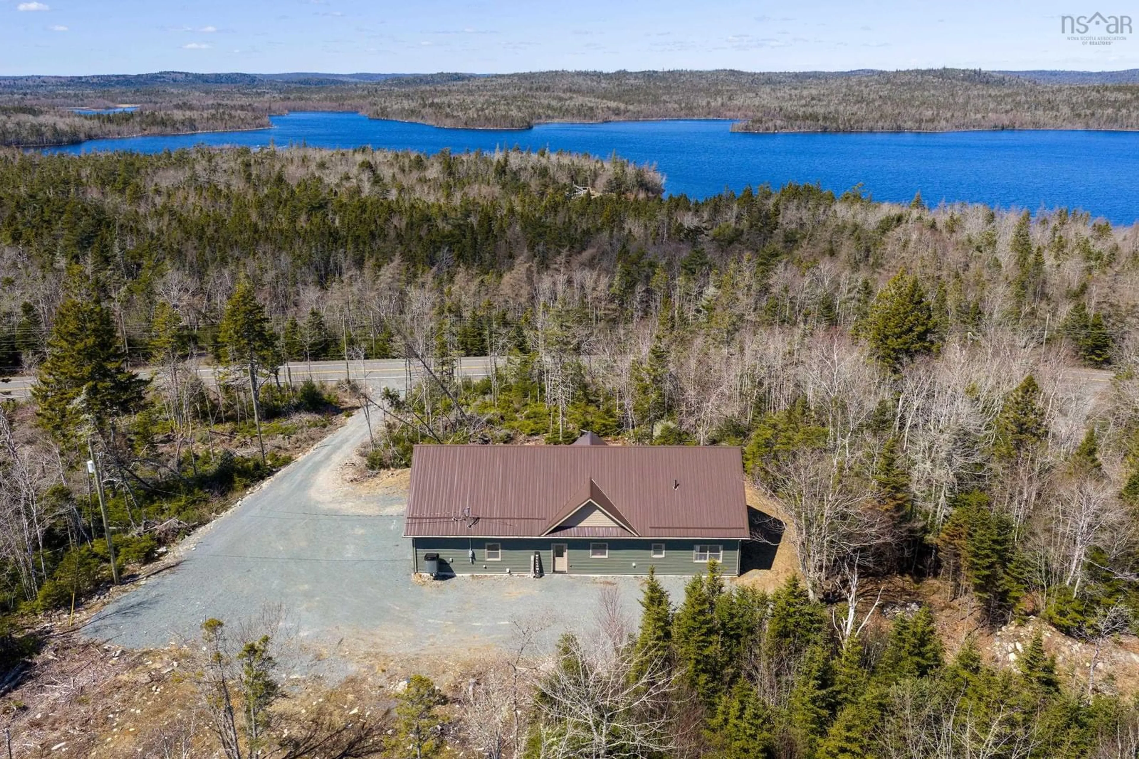 A pic from outside/outdoor area/front of a property/back of a property/a pic from drone, water/lake/river/ocean view for 12844 Highway 7 Ship Harbour Hwy, Ship Harbour Nova Scotia B0J 2L9