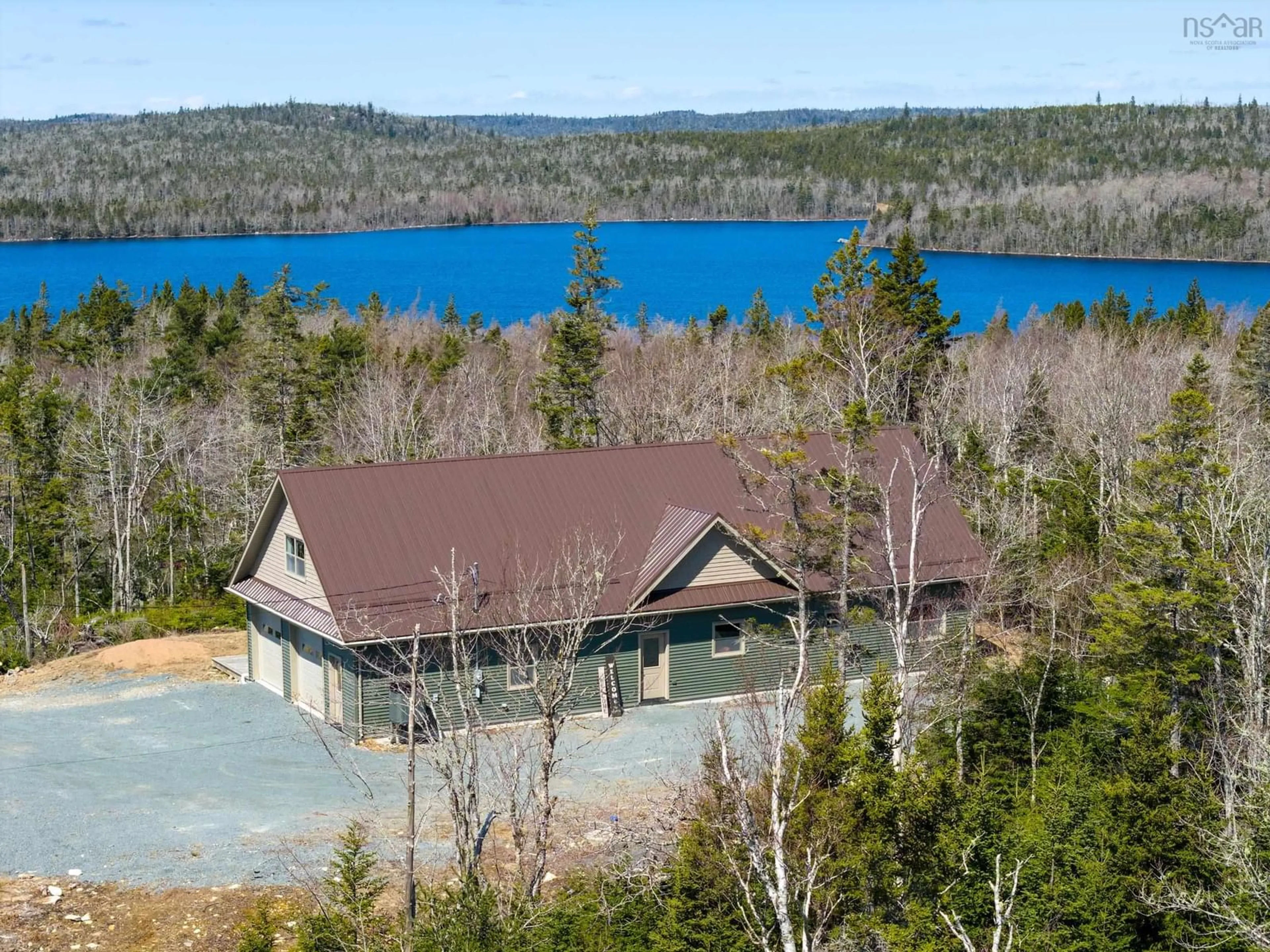 A pic from outside/outdoor area/front of a property/back of a property/a pic from drone, water/lake/river/ocean view for 12844 Highway 7 Ship Harbour Hwy, Ship Harbour Nova Scotia B0J 2L9