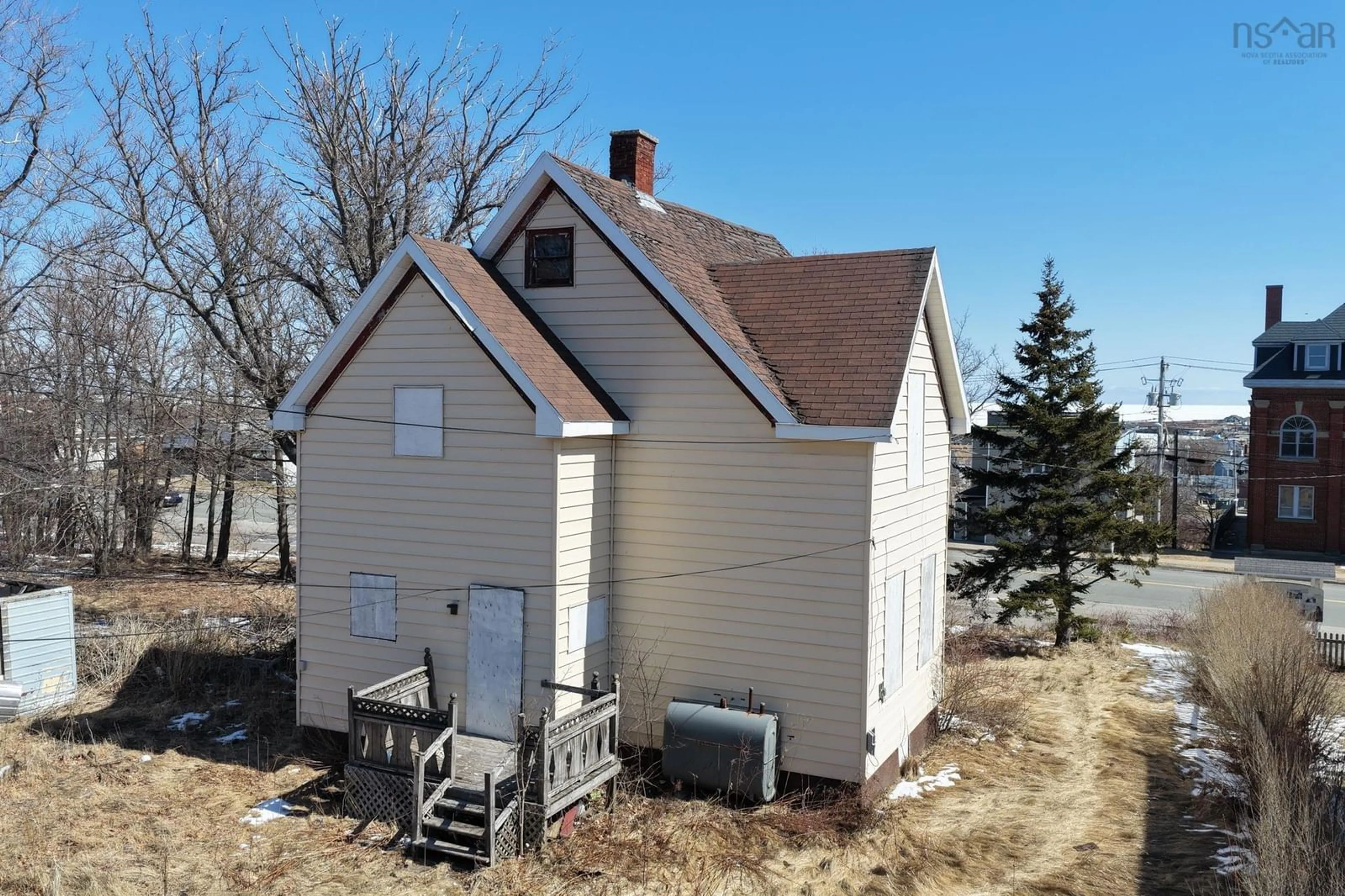A pic from outside/outdoor area/front of a property/back of a property/a pic from drone, building for 15 Mckeen St, Glace Bay Nova Scotia B1A 5C2
