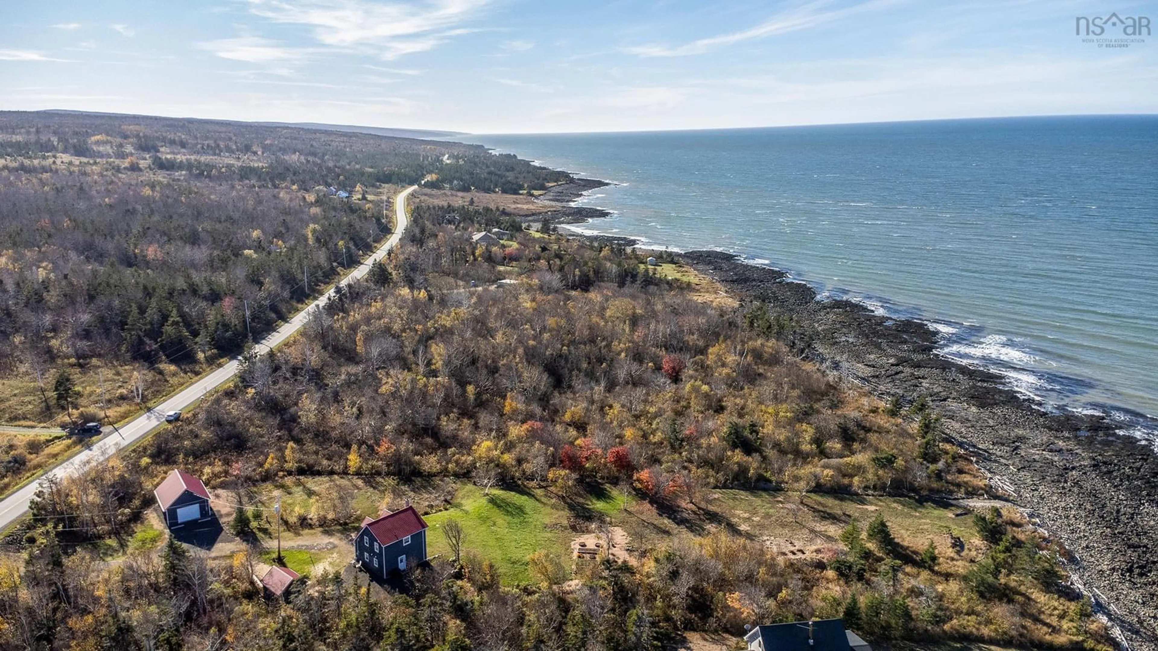 A pic from outside/outdoor area/front of a property/back of a property/a pic from drone, water/lake/river/ocean view for 6437 Shore Road West, Youngs Cove Nova Scotia B0S 1L0